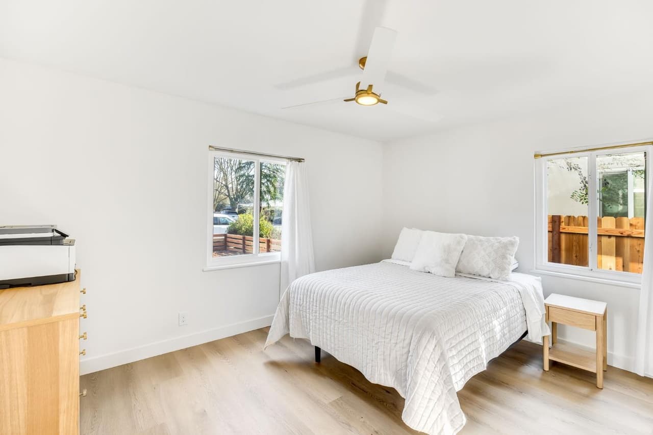 House Renovation in Davis — luxury vinyl plank, vaulted ceiling, recessed lighting, open-concept layout, engineered wood flooring