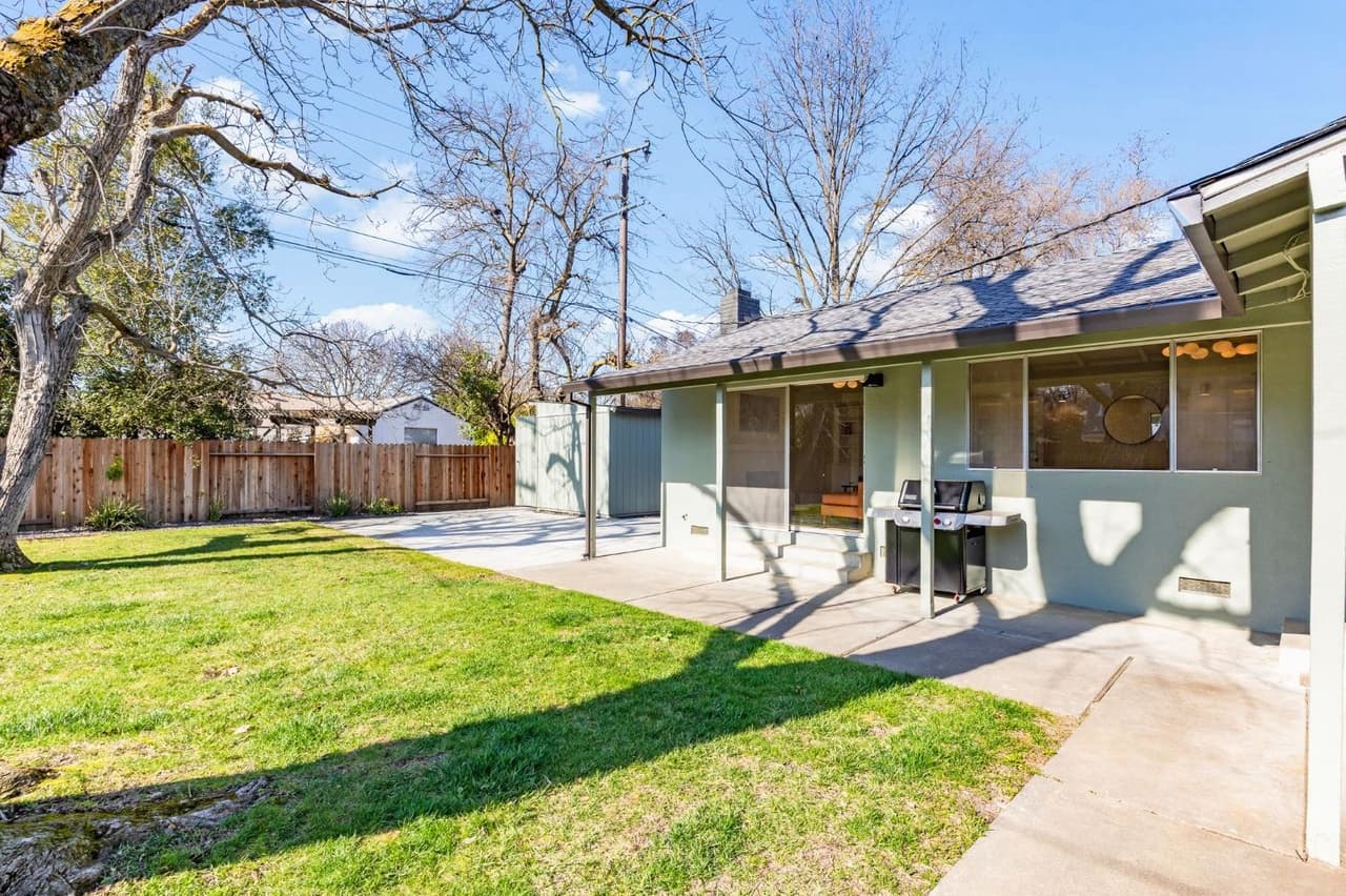House Renovation in Davis — covered patio, stucco facade, exterior paint, deck, pergola