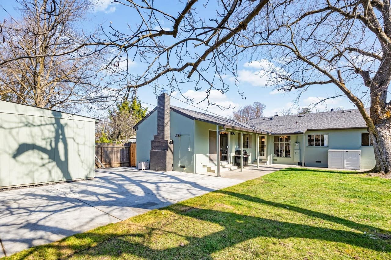 House Renovation in Davis — exterior paint, covered patio, fireplace, garage door, stucco facade