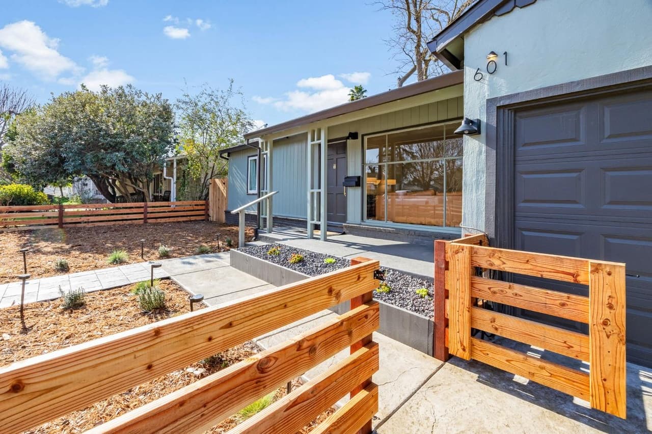 House Renovation in Davis — stucco facade, garage door, front porch, landscape lighting, exterior paint