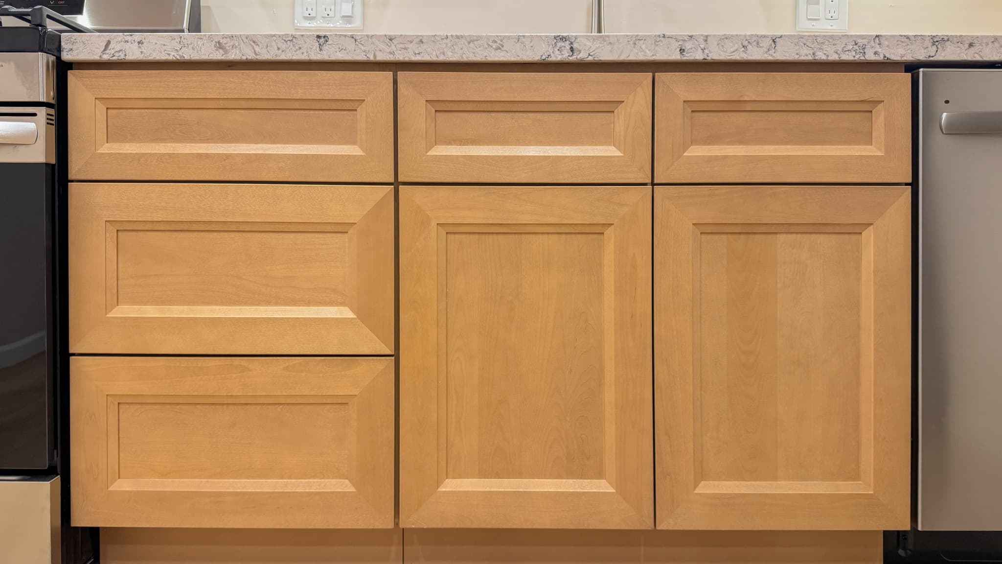 Kitchen Remodel in Sacramento — raised-panel cabinets, quartz countertop, stainless appliances, custom cabinetry
