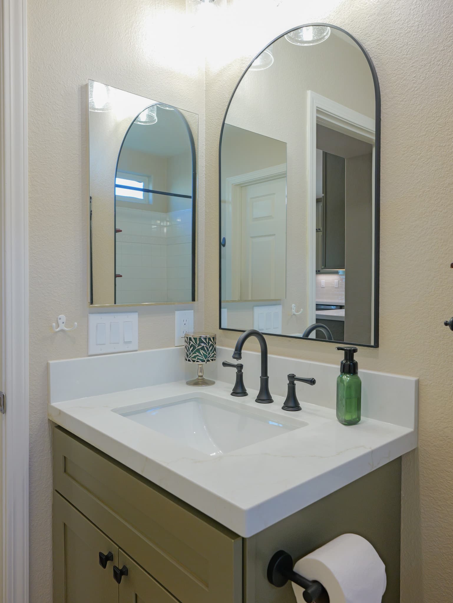 Bathroom Remodel in Sacramento — single vanity, undermount sink, quartz countertop, shaker cabinets, framed mirror