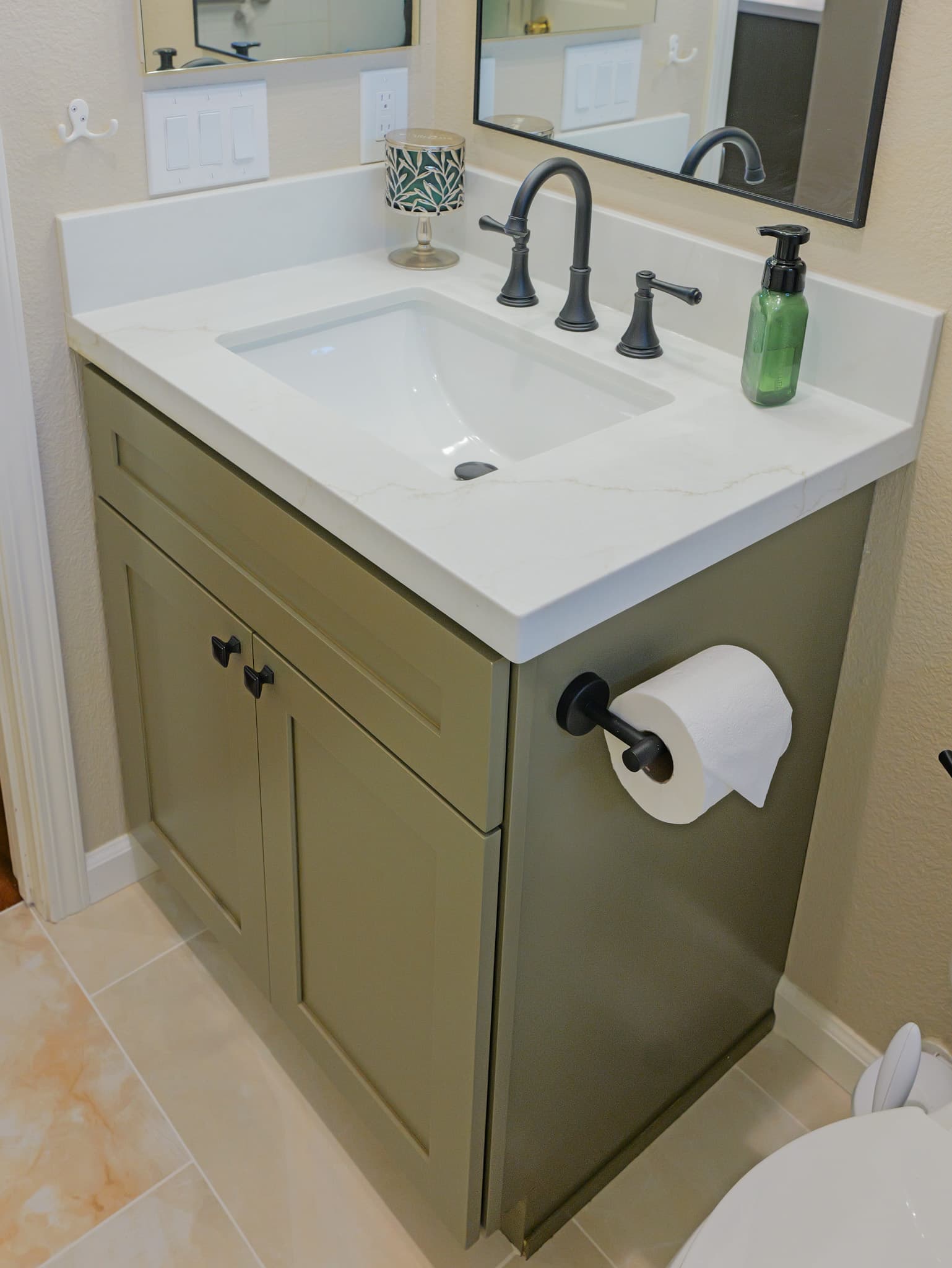 Bathroom Remodel in Sacramento — single vanity, shaker cabinets, undermount sink, quartz countertop, framed mirror