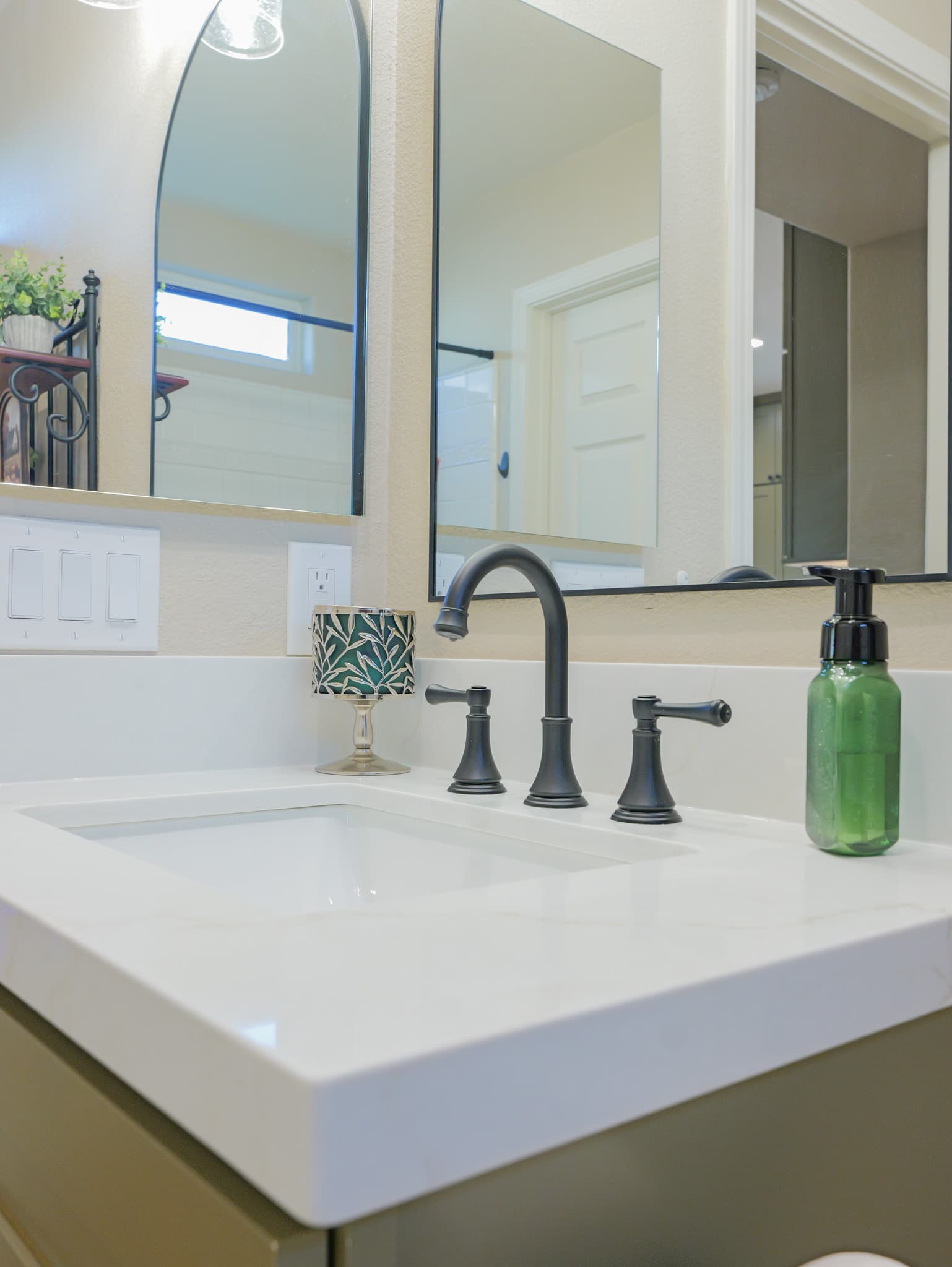 Bathroom Remodel in Sacramento — single vanity, undermount sink, quartz countertop, framed mirror, floating vanity