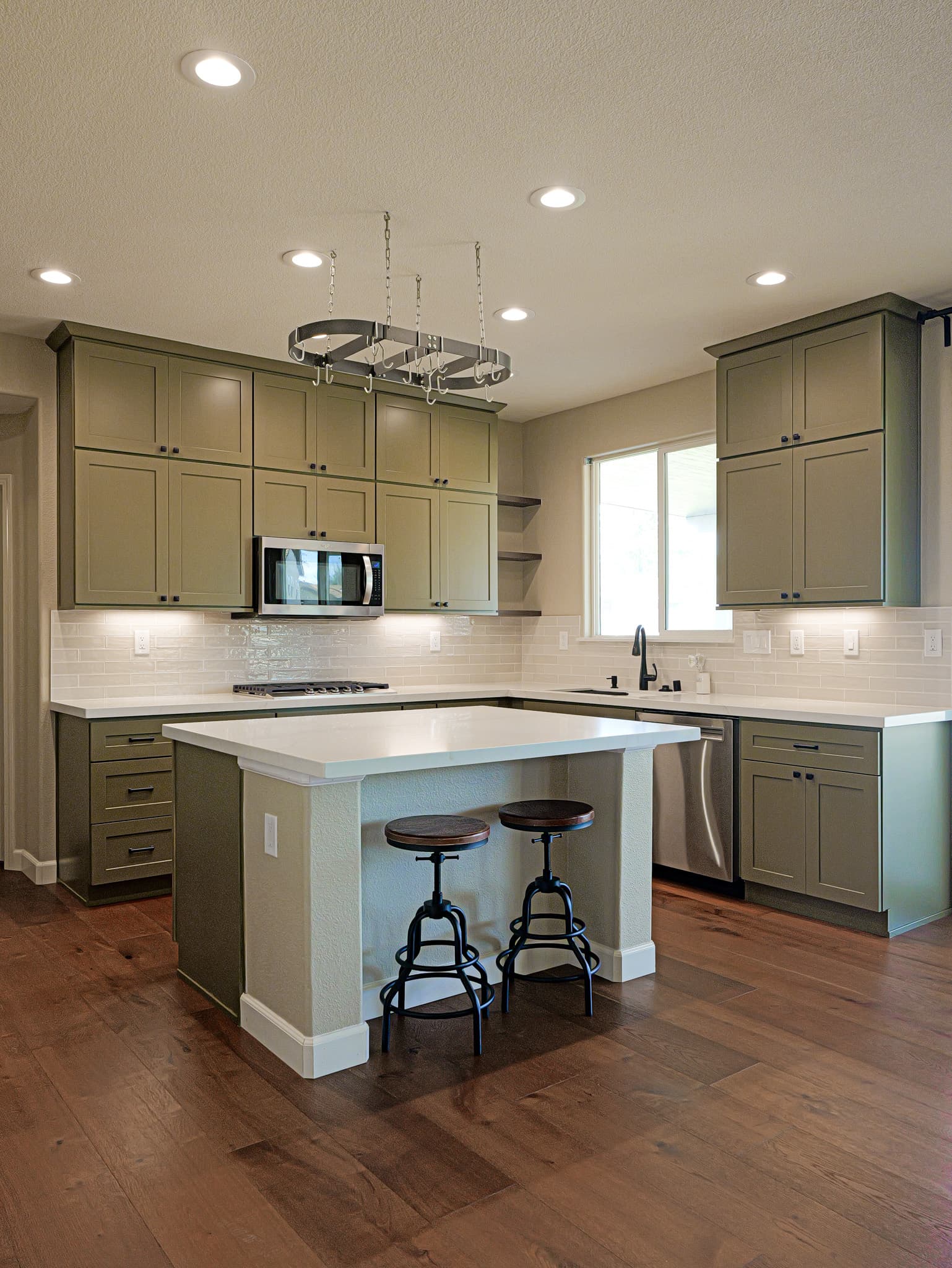 Bathroom Remodel in Sacramento — shaker cabinets, kitchen island, subway tile backsplash, recessed lighting, hardwood flooring