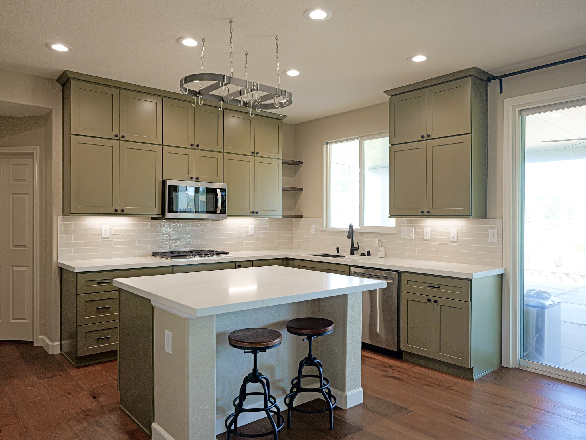 Bathroom Remodel in Sacramento — shaker cabinets, kitchen island, quartz countertop, subway tile backsplash, recessed lighting, hardwood flooring