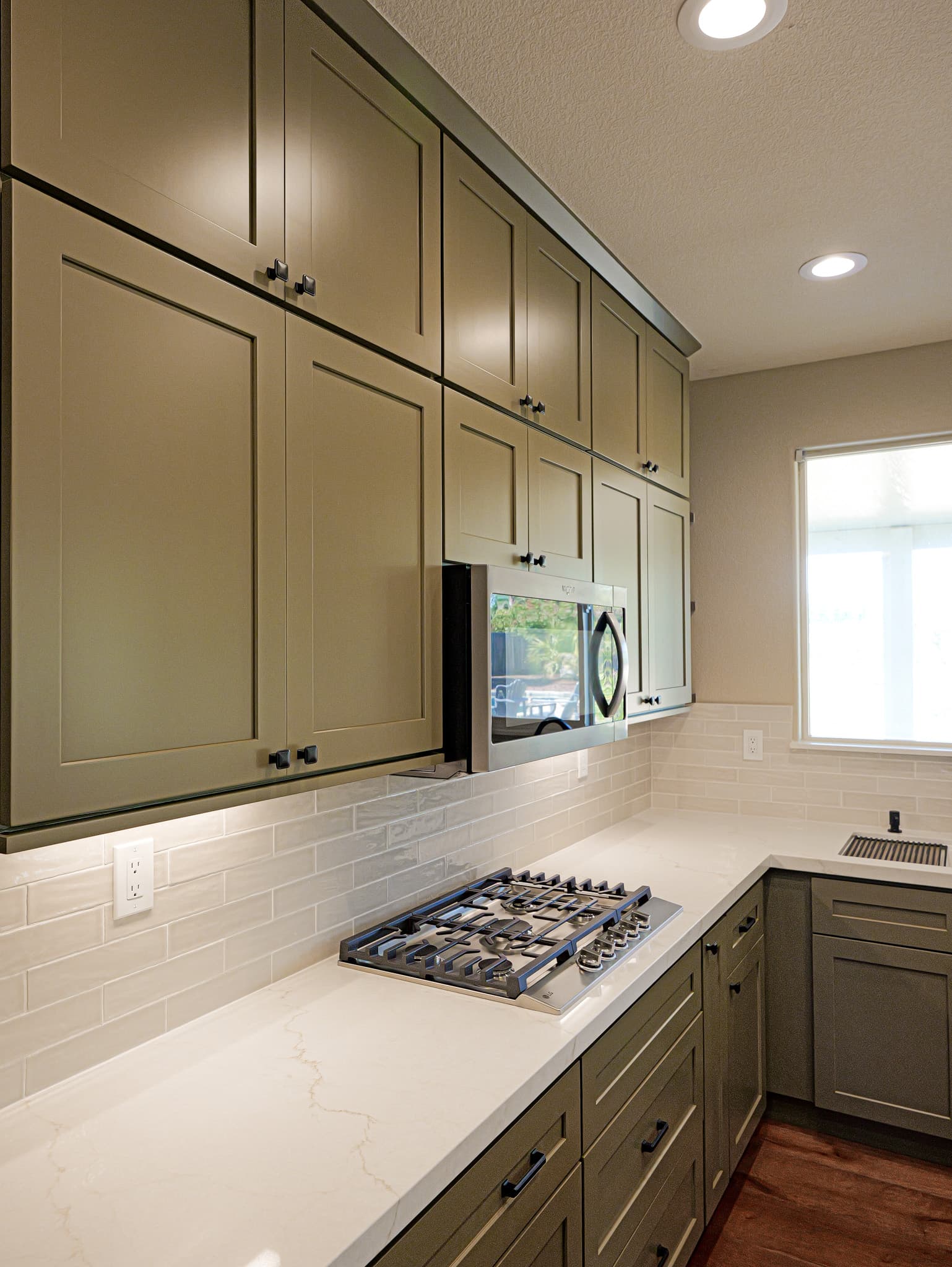 Bathroom Remodel in Sacramento — shaker cabinets, quartz countertop, subway tile backsplash, recessed lighting, under-cabinet lighting