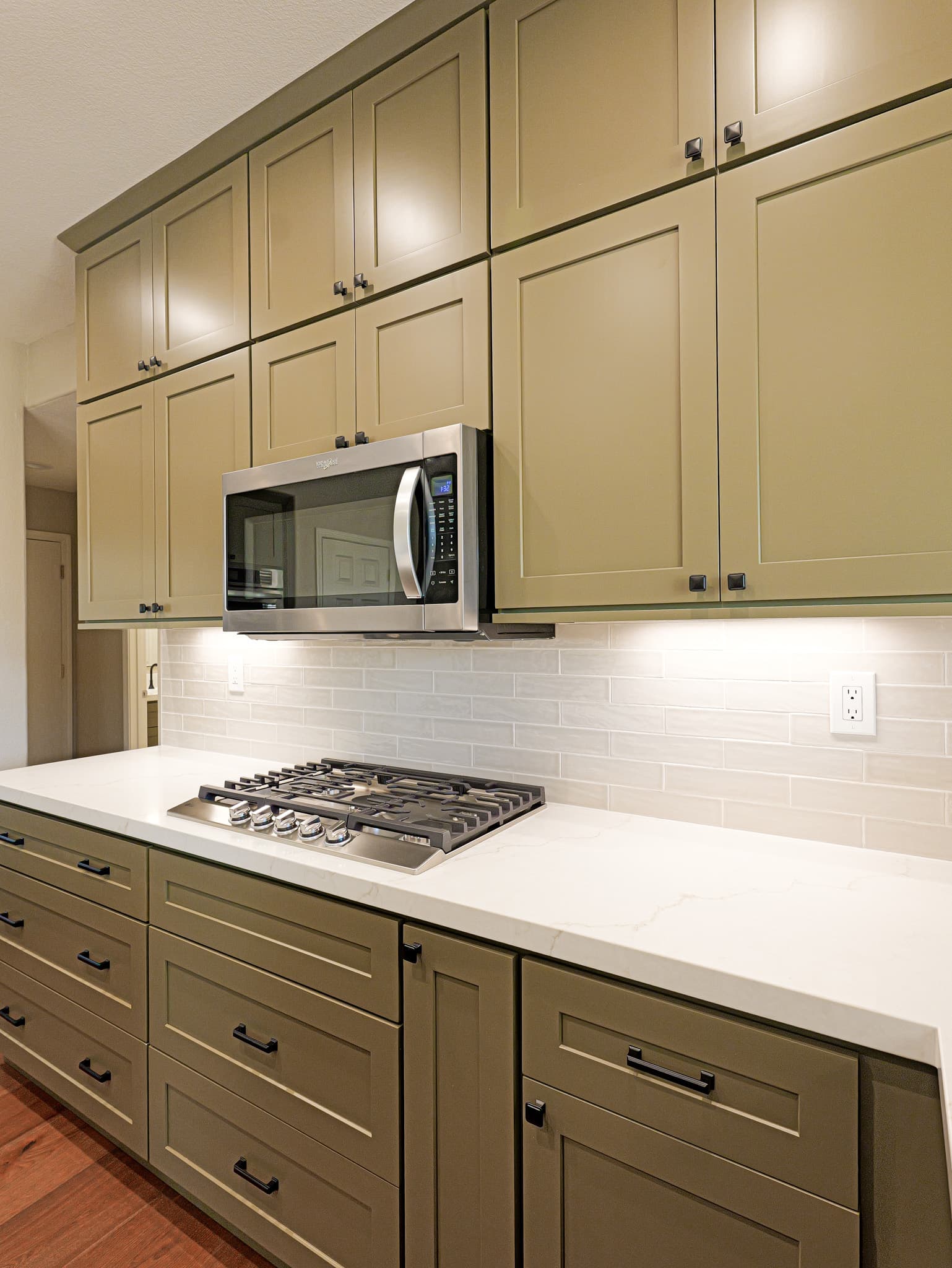 Bathroom Remodel in Sacramento — shaker cabinets, quartz countertop, subway tile backsplash, under-cabinet lighting, stainless appliances