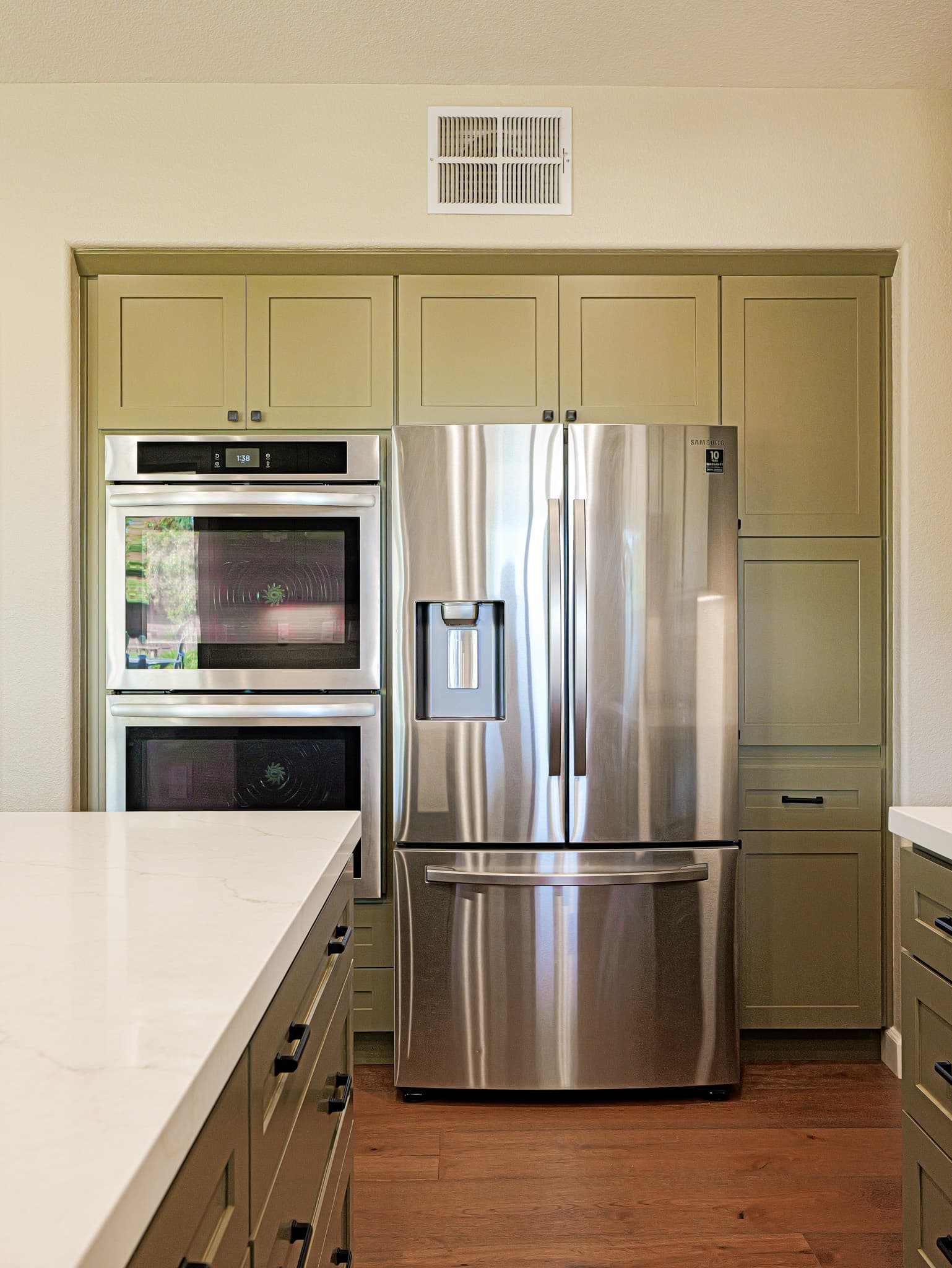 Bathroom Remodel in Sacramento — shaker cabinets, double oven, stainless appliances, quartz countertop, hardwood flooring