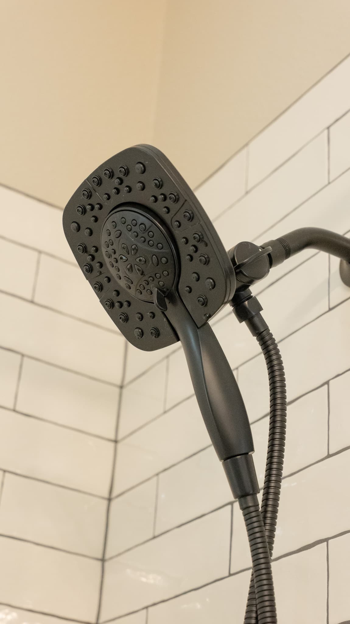 Bathroom Remodel in Sacramento — handheld shower, tiled shower surround, walk-in shower, subway tile backsplash