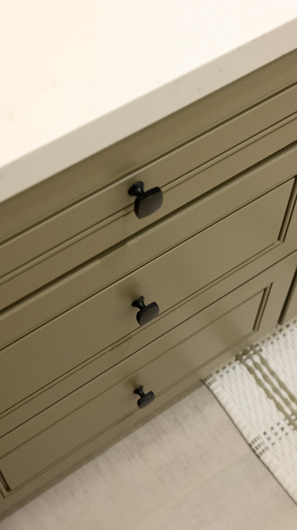 Bathroom Remodel in Sacramento — raised-panel cabinets, quartz countertop, single vanity, porcelain tile flooring