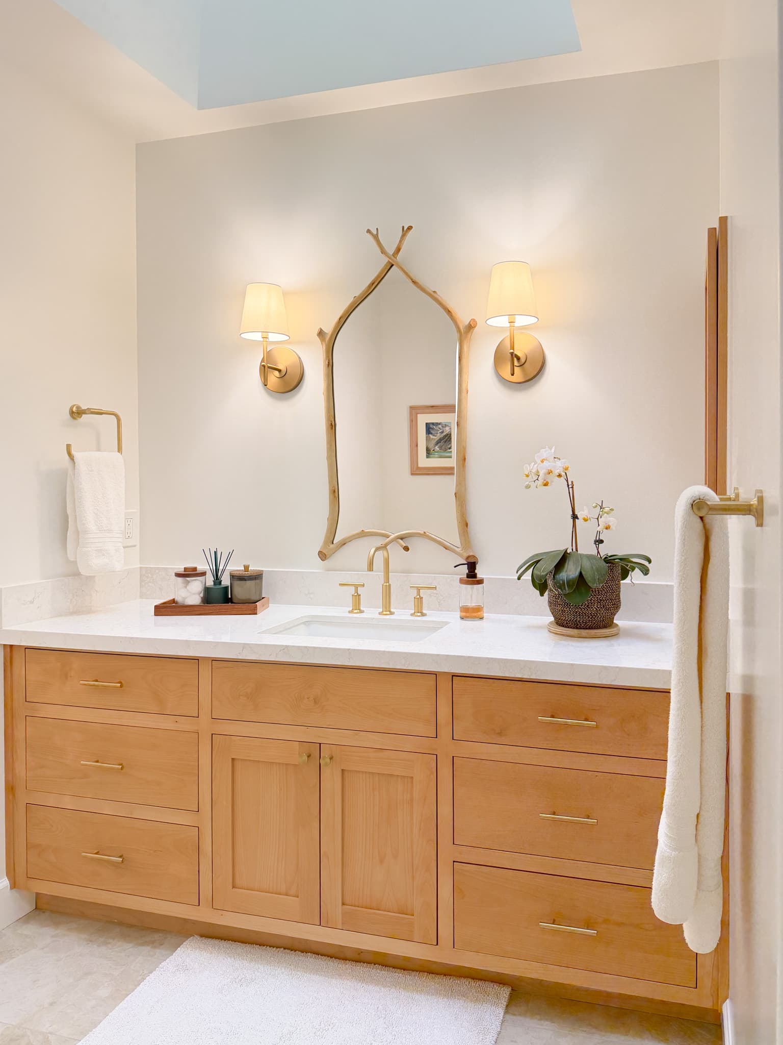 Bathroom Remodel in Carmichael — shaker cabinets, single vanity, undermount sink, quartz countertop, framed mirror