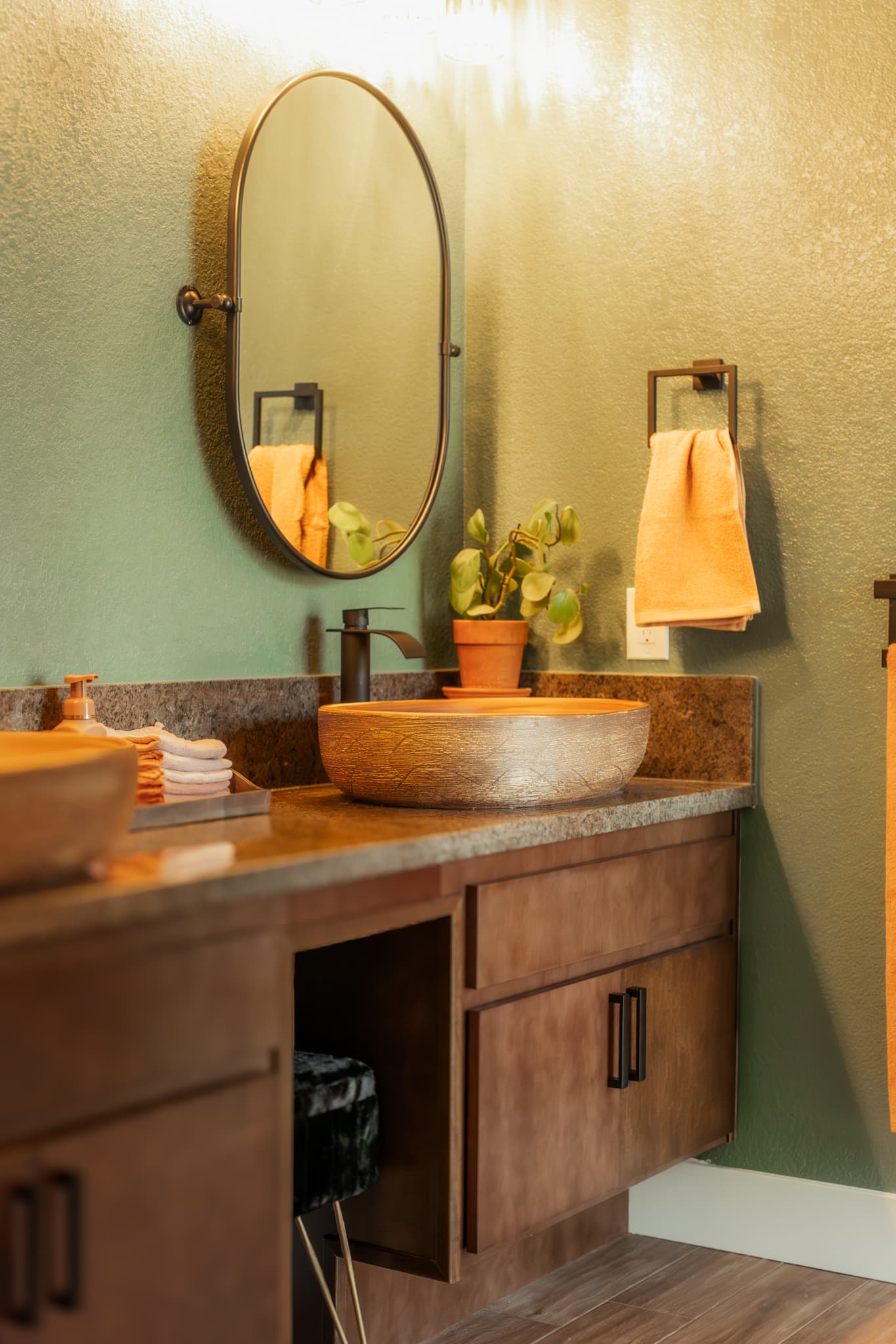 Bathroom Remodel in Sacramento — vessel sink, single vanity, granite countertop, framed mirror, luxury vinyl plank