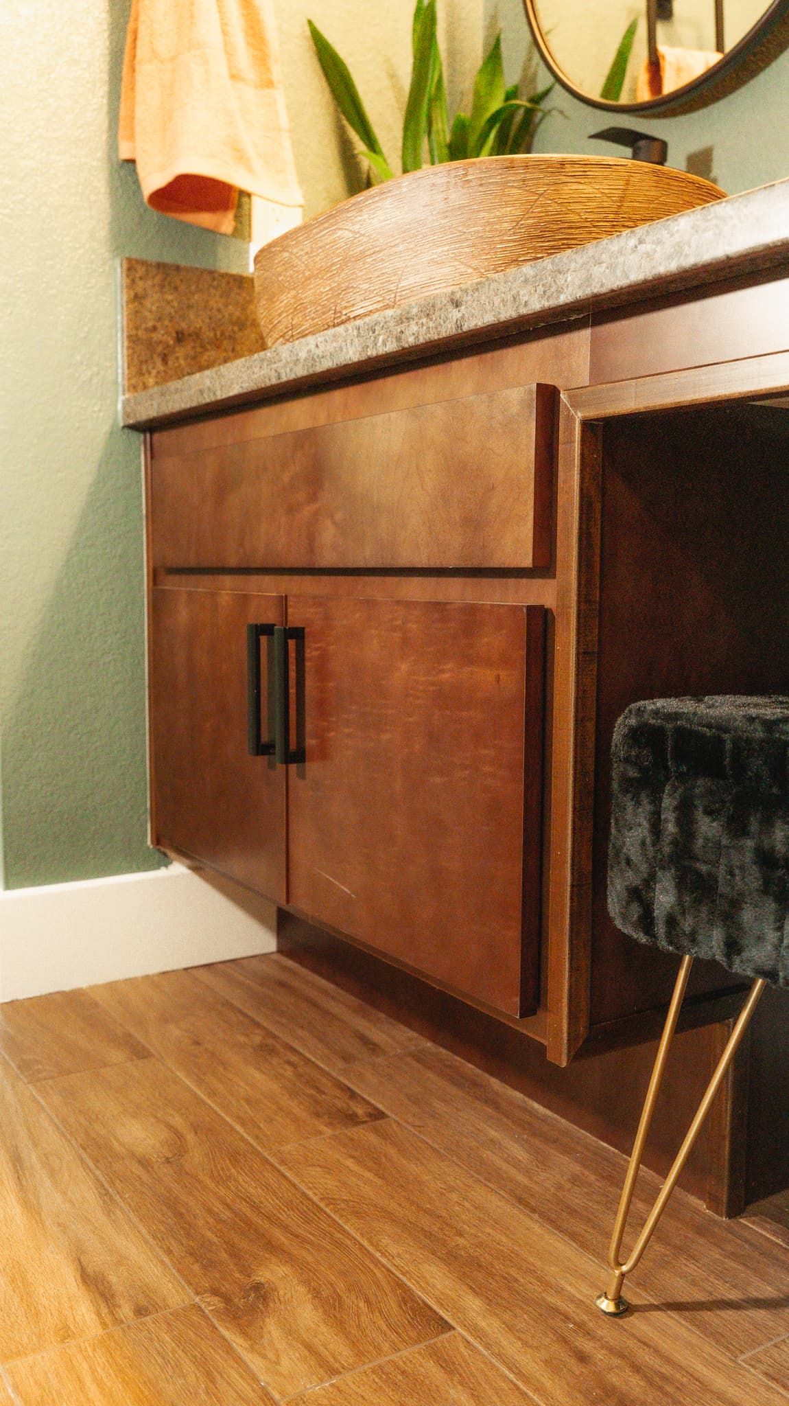 Bathroom Remodel in Sacramento — single vanity, granite countertop, shaker cabinets, framed mirror, porcelain tile flooring