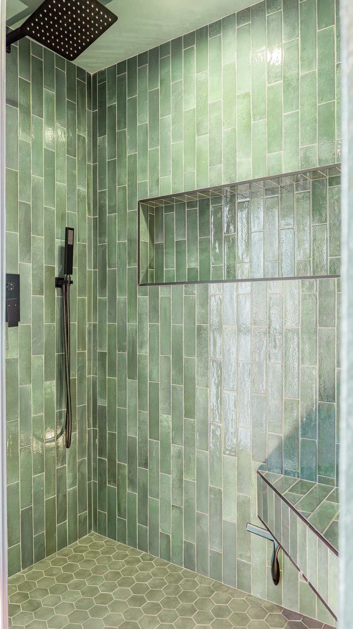 Bathroom Remodel in Sacramento — walk-in shower, tiled shower surround, rain shower head, handheld shower, shower bench