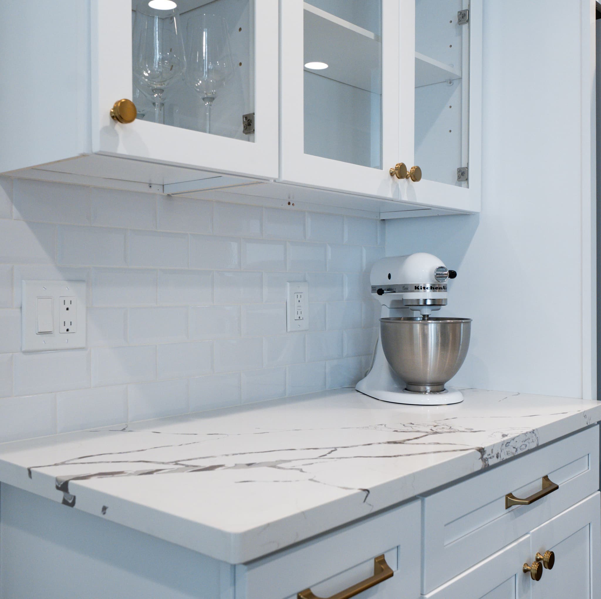 Kitchen Remodel in Roseville — shaker cabinets, two-tone cabinetry, quartz countertop, subway tile backsplash, under-cabinet lighting