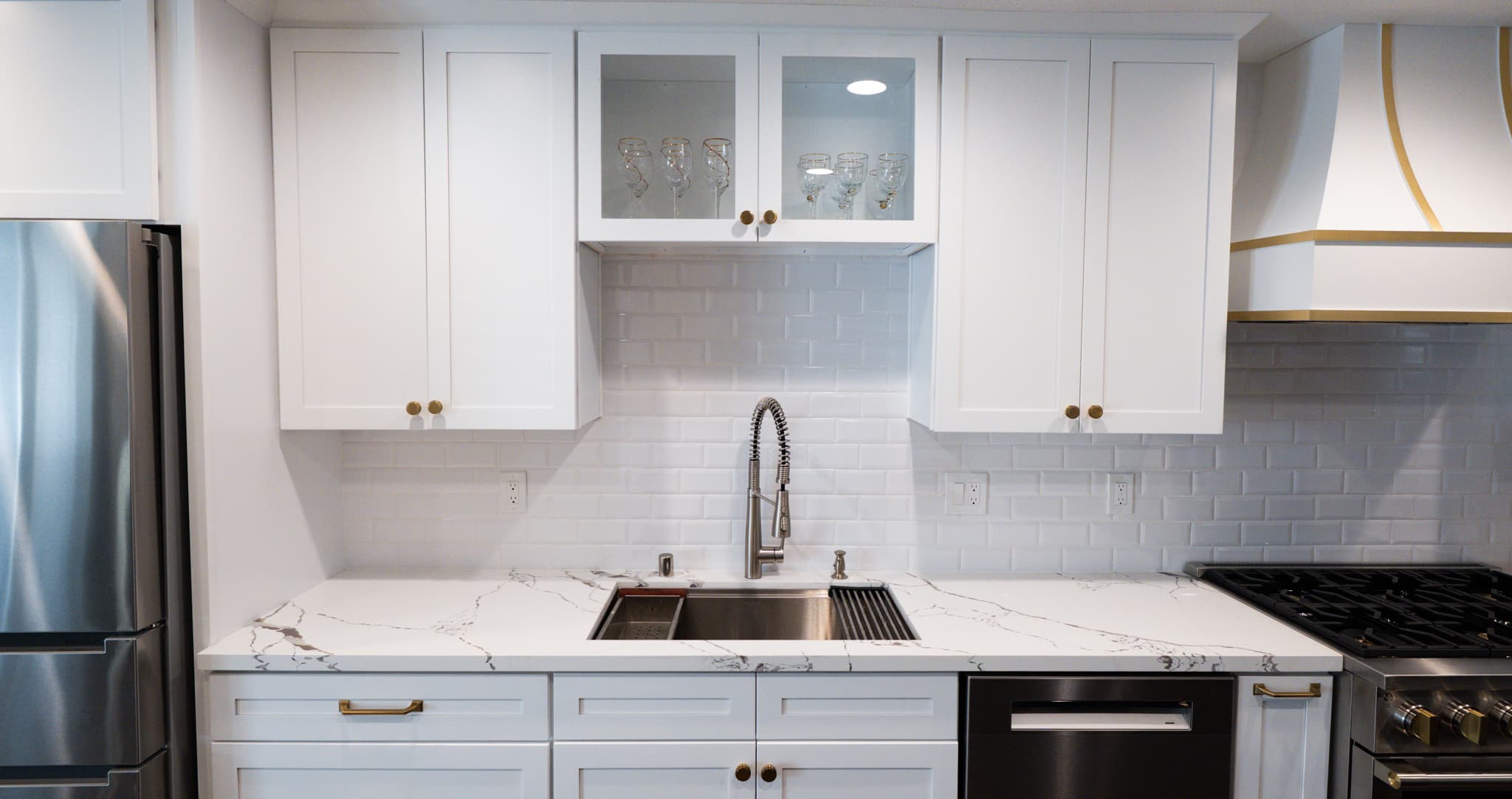 Kitchen Remodel in Roseville — shaker cabinets, quartz countertop, subway tile backsplash, undermount sink, range hood