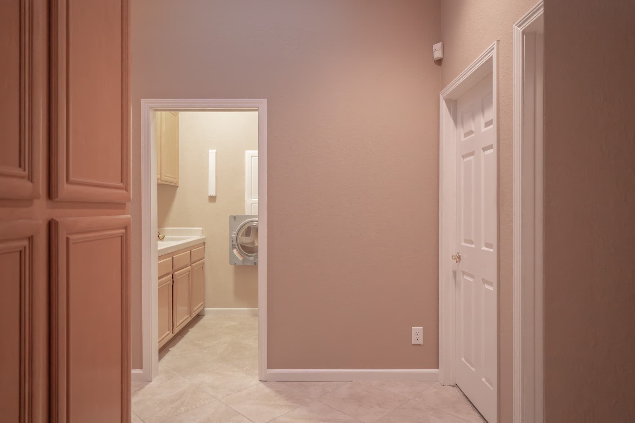 Bathroom Remodel in Sacramento — before remodel — original finishes, raised-panel cabinets, ceramic tile flooring, single vanity