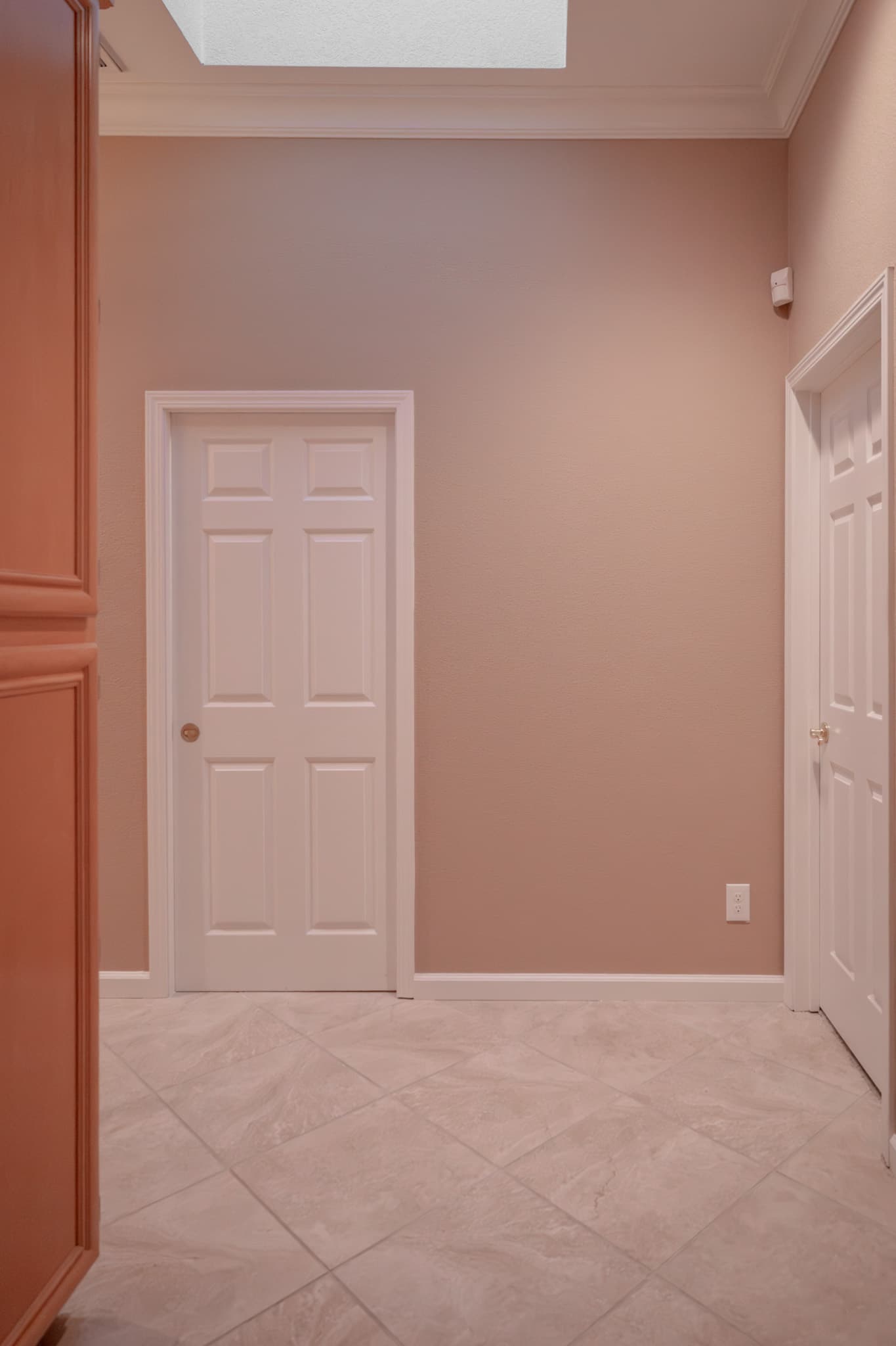 Bathroom Remodel in Sacramento — before remodel — original finishes, ceramic tile flooring, crown moulding, raised-panel cabinets