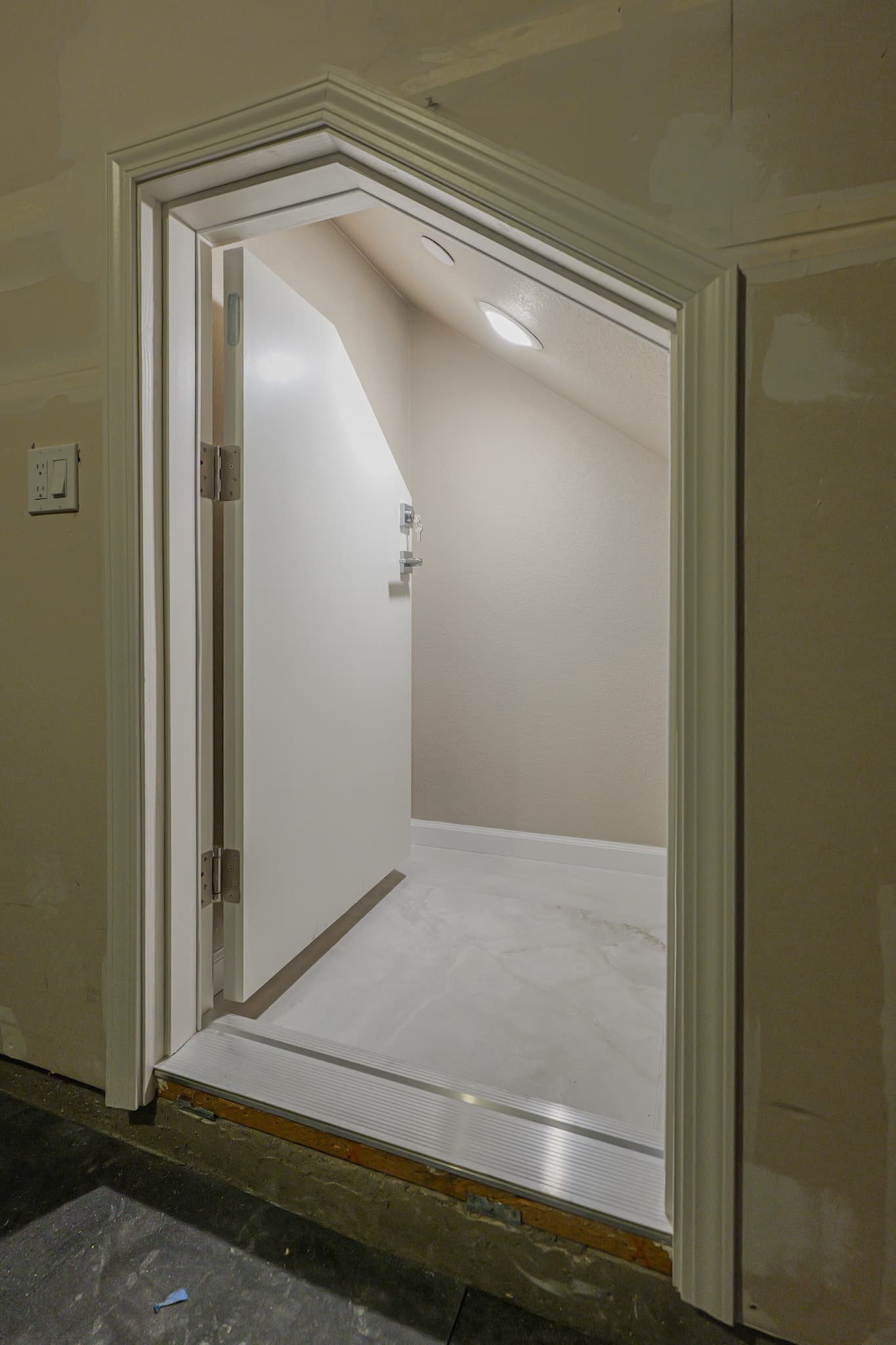 Kitchen Remodel in Sacramento — vaulted ceiling, recessed lighting, crown moulding, marble tile flooring, built-in shelving