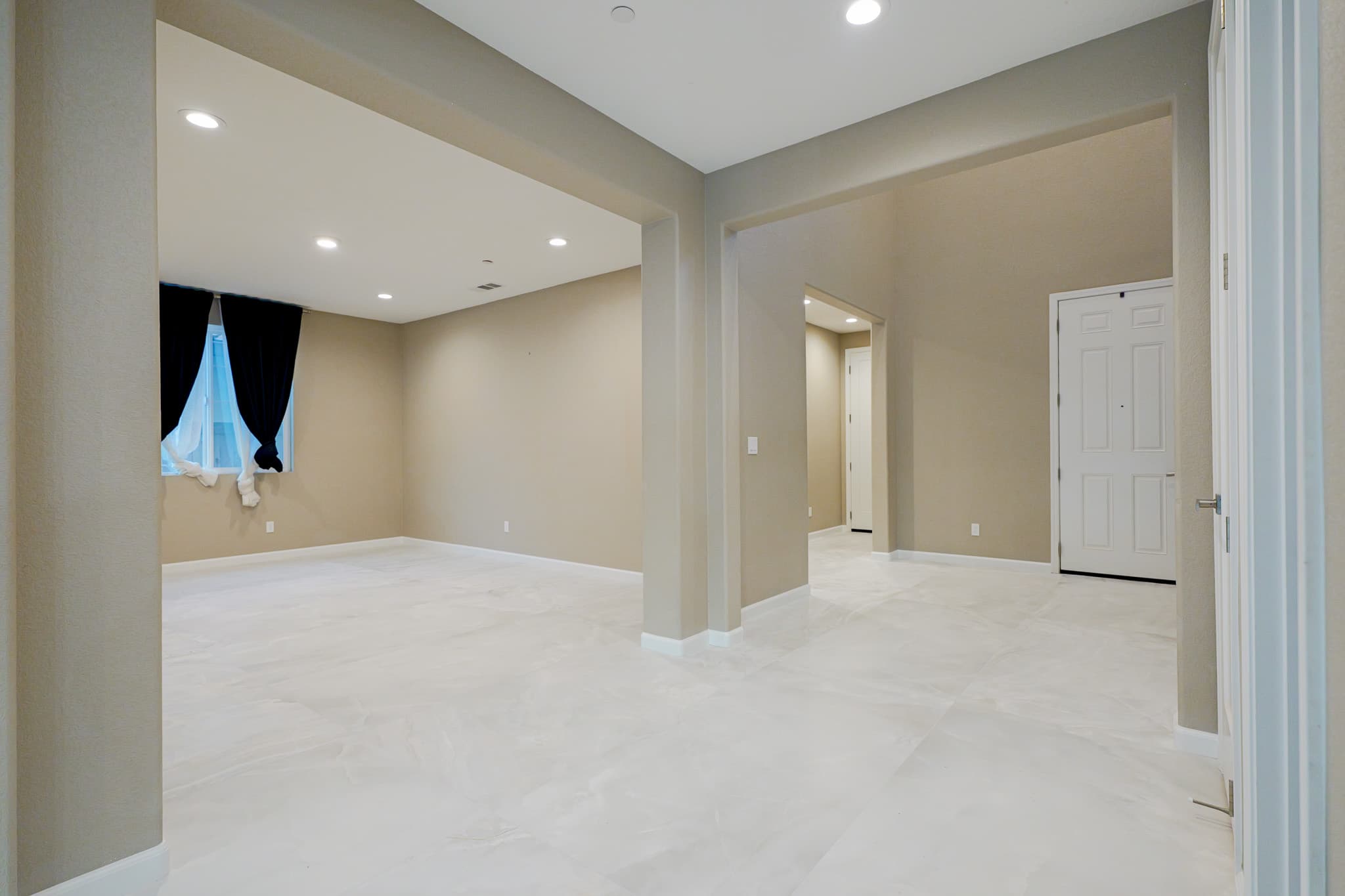Kitchen Remodel in Sacramento — porcelain tile flooring, recessed lighting, open-concept layout, marble tile flooring