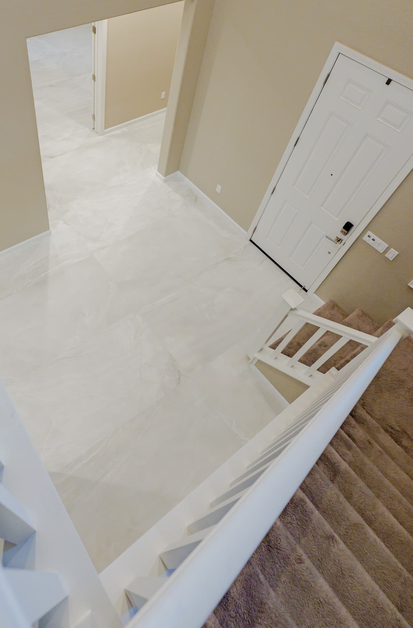 Kitchen Remodel in Sacramento — marble tile flooring, open-concept layout, vaulted ceiling, crown moulding