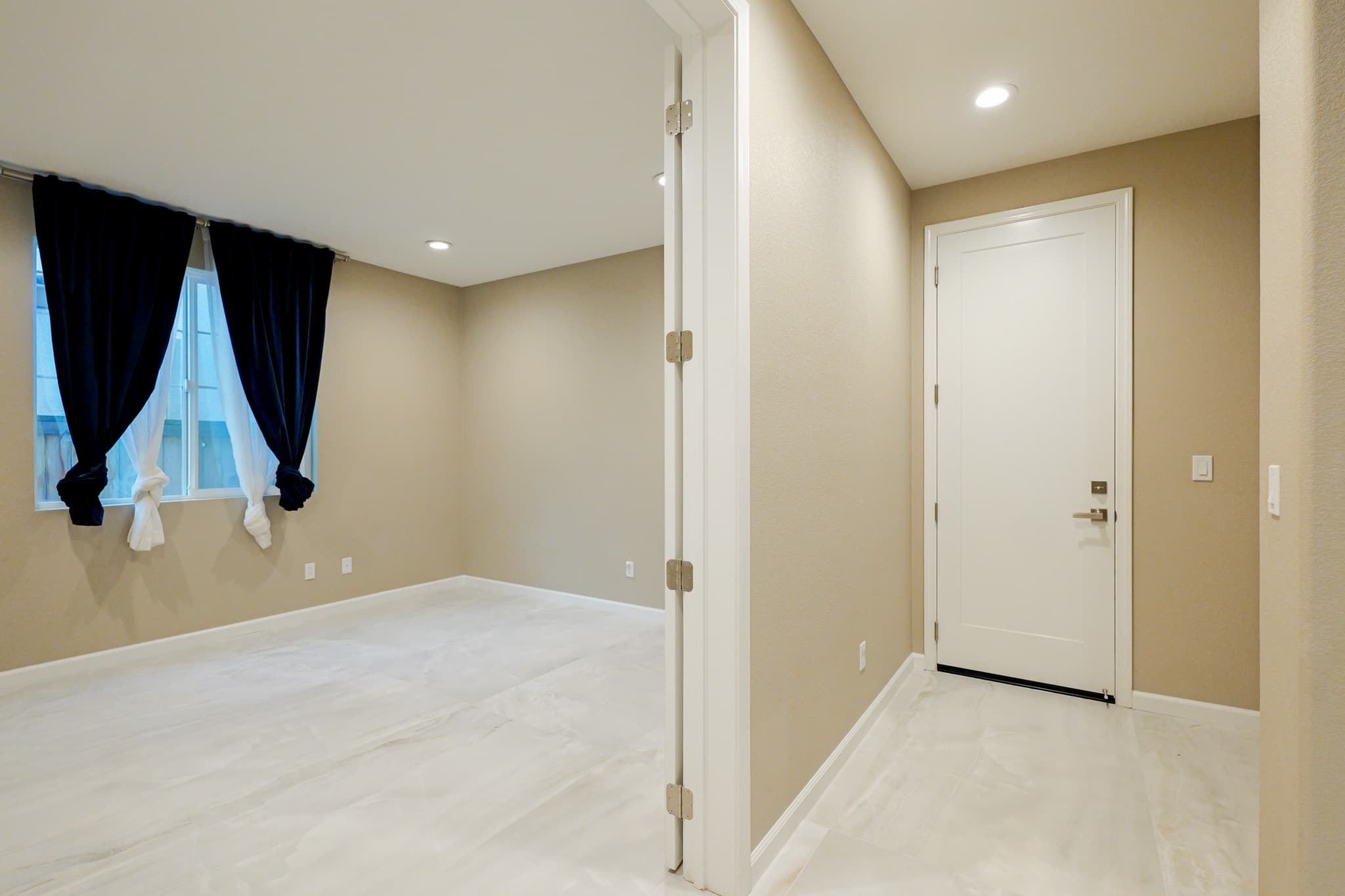 Kitchen Remodel in Sacramento — marble tile flooring, recessed lighting, open-concept layout, vaulted ceiling
