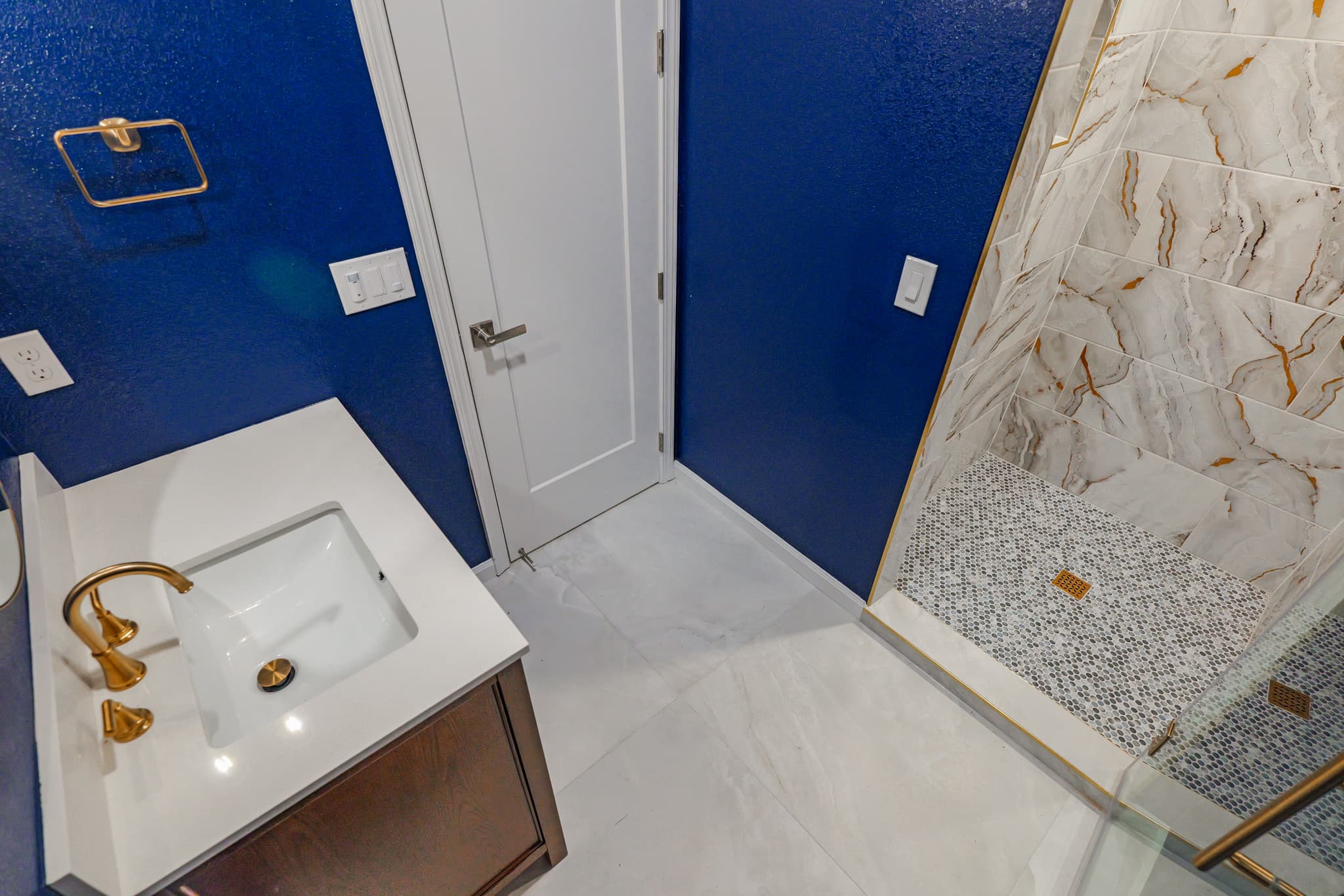 Kitchen Remodel in Sacramento — walk-in shower, frameless glass shower, tiled shower surround, single vanity, undermount sink