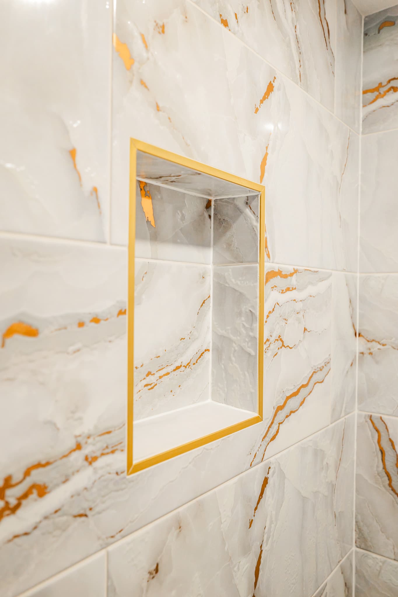 Kitchen Remodel in Sacramento — tiled shower surround, marble tile flooring, walk-in shower, built-in shelving, natural-stone backsplash