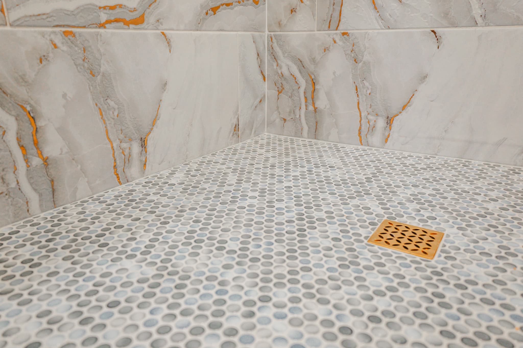 Kitchen Remodel in Sacramento — tiled shower surround, walk-in shower, mosaic backsplash, marble tile flooring, natural-stone tile flooring