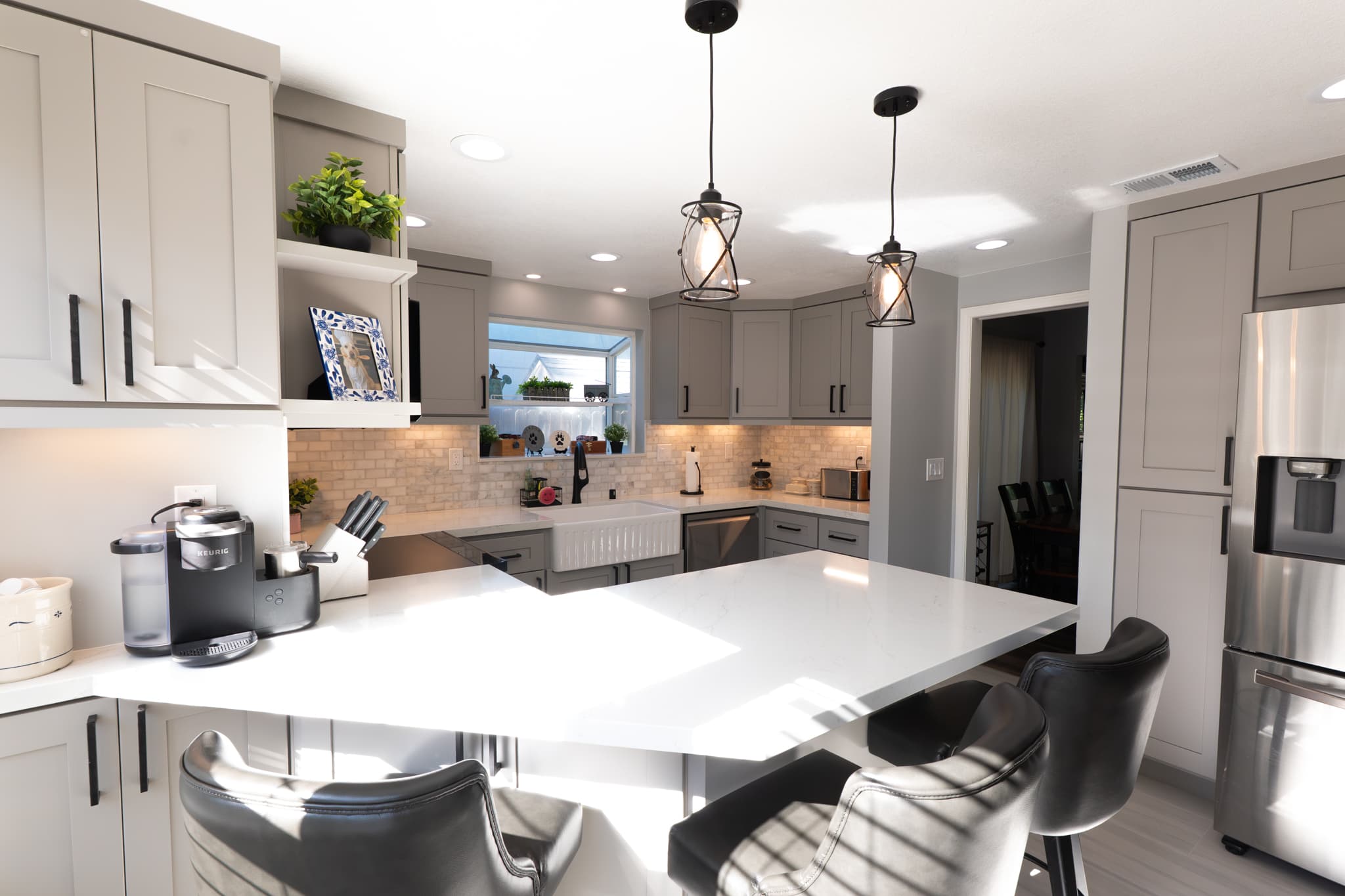 Kitchen Remodel in Citrus Heights — shaker cabinets, quartz countertop, farmhouse sink, pendant lighting, subway tile backsplash