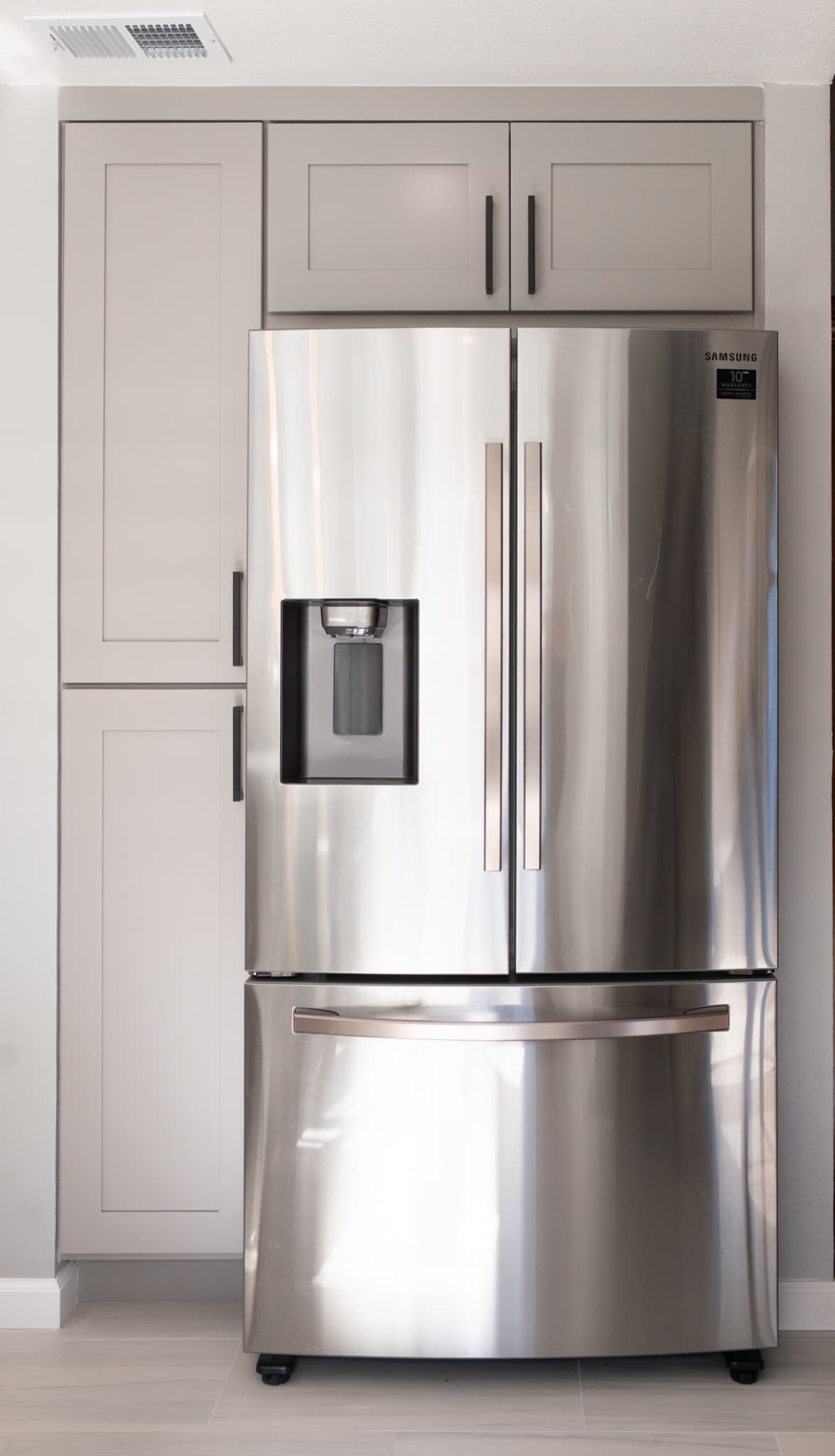 Kitchen Remodel in Citrus Heights — shaker cabinets, stainless appliances, linen tower, recessed lighting, luxury vinyl plank