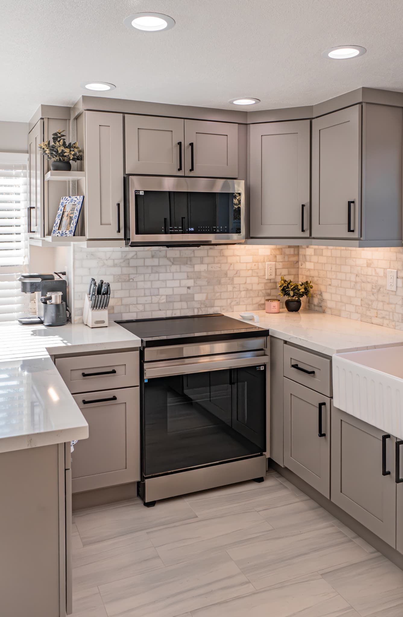 Kitchen Remodel in Citrus Heights — shaker cabinets, quartz countertop, natural-stone backsplash, recessed lighting, stainless appliances