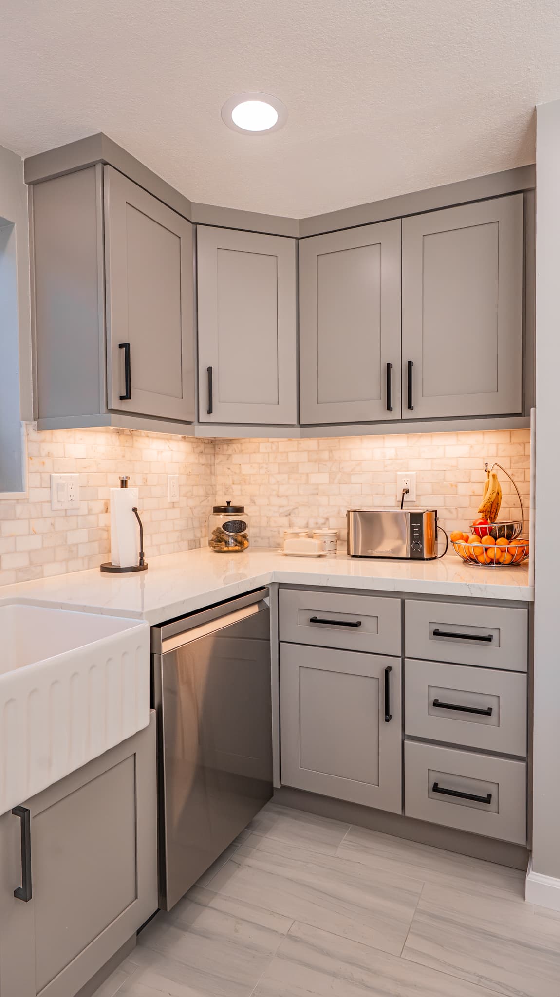 Kitchen Remodel in Citrus Heights — shaker cabinets, quartz countertop, natural-stone backsplash, under-cabinet lighting, farmhouse sink