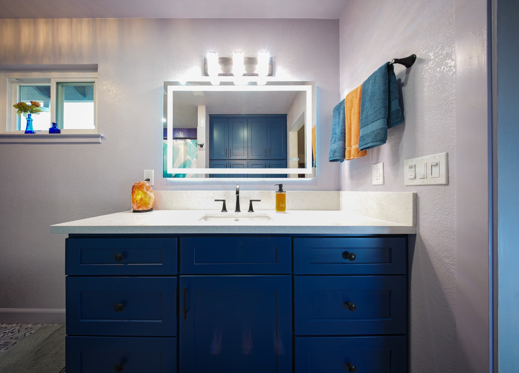 House Renovation in Rocklin — single vanity, lighted mirror, shaker cabinets, quartz countertop, undermount sink
