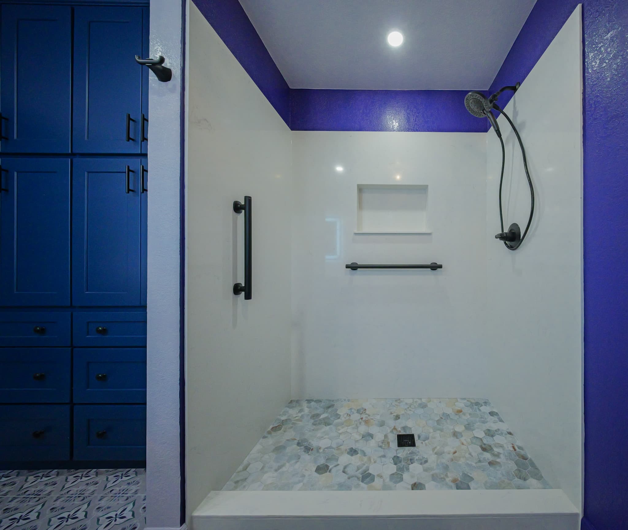 House Renovation in Rocklin — walk-in shower, handheld shower, mosaic backsplash, recessed lighting, raised-panel cabinets