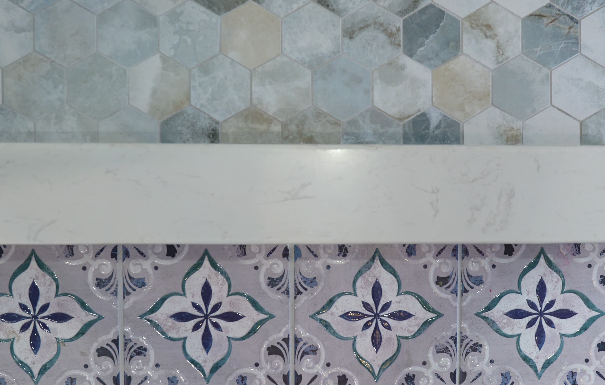House Renovation in Rocklin — mosaic backsplash, quartz countertop, tiled shower surround, ceramic tile flooring, natural-stone backsplash
