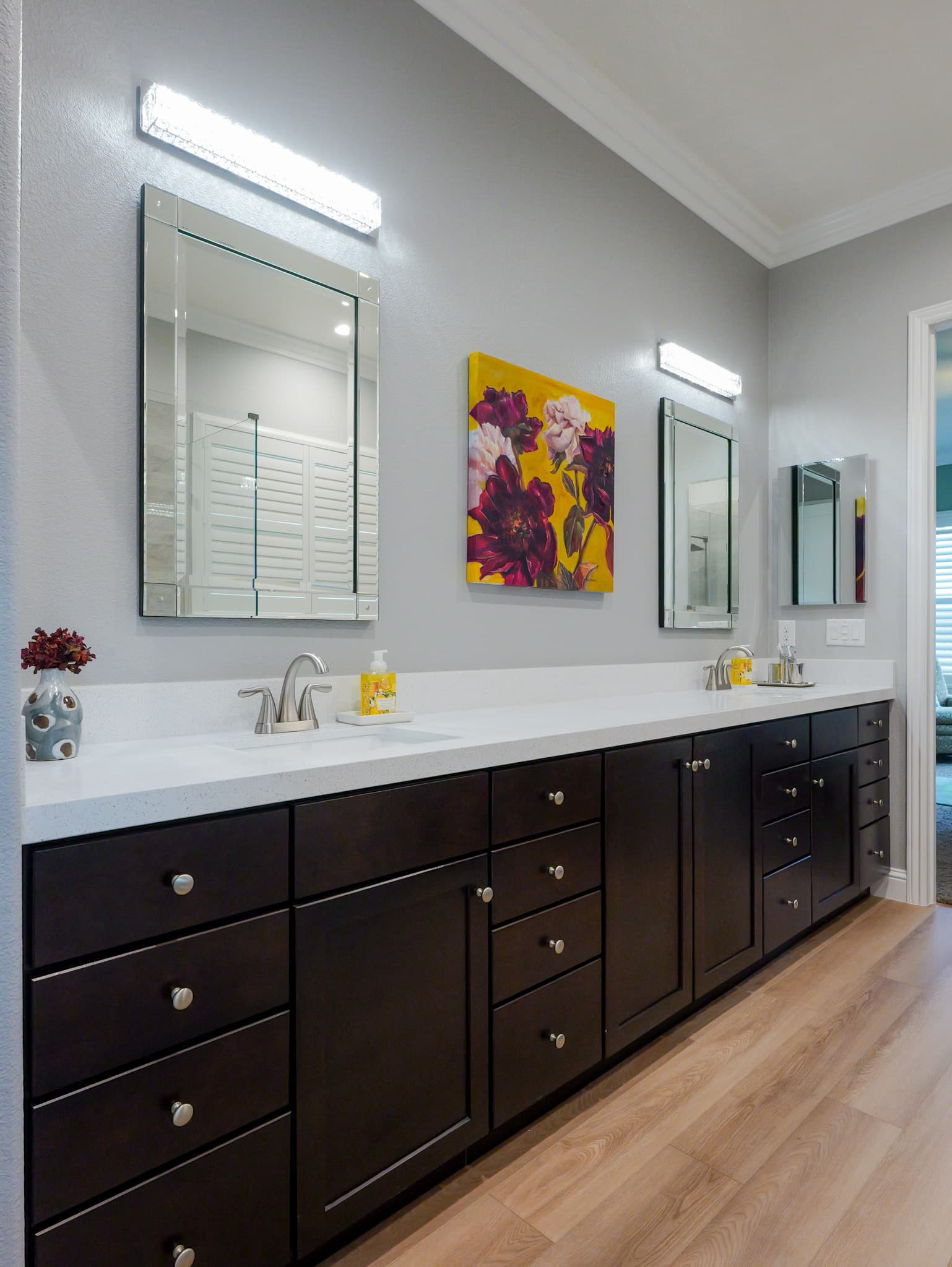 Bathroom Remodel in Roseville — double vanity, shaker cabinets, quartz countertop, undermount sink, luxury vinyl plank