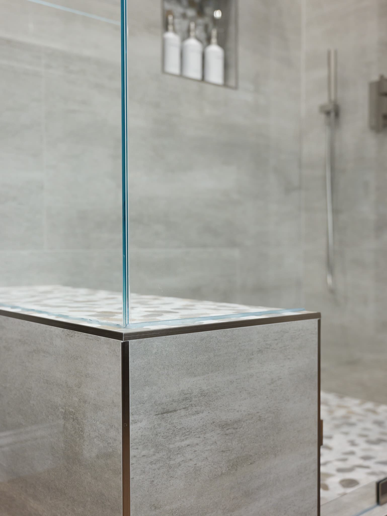 Bathroom Remodel in Roseville — frameless glass shower, tiled shower surround, walk-in shower, handheld shower, mosaic backsplash