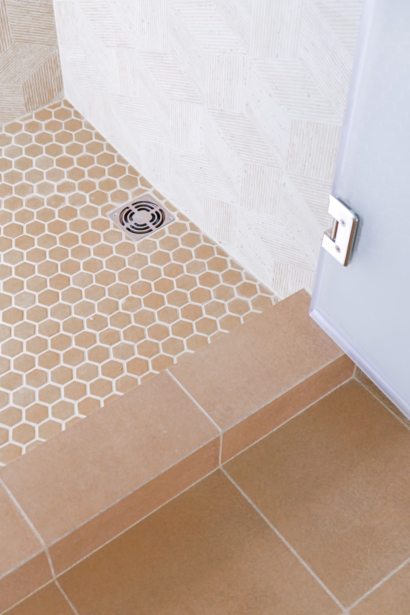 Bathroom Remodel in Sacramento — walk-in shower, tiled shower surround, mosaic backsplash, ceramic tile flooring, frameless glass shower