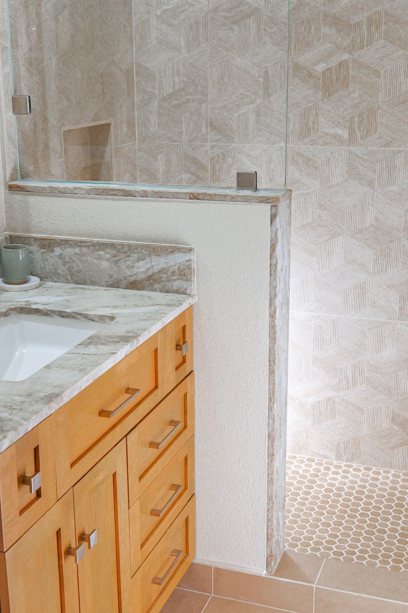 Bathroom Remodel in Sacramento — single vanity, undermount sink, marble countertop, tiled shower surround, frameless glass shower