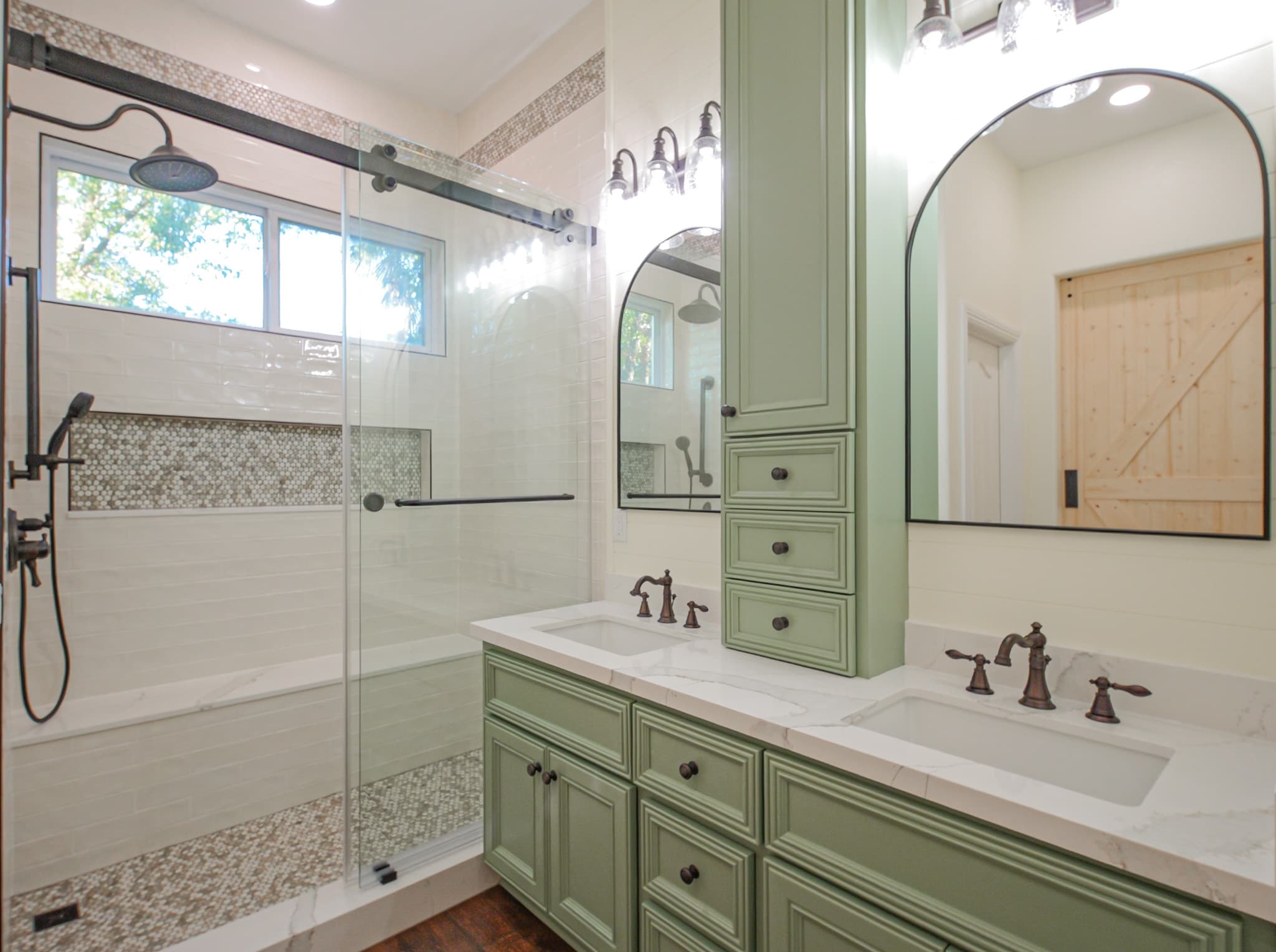 Bathroom Remodel in Sacramento — double vanity, frameless glass shower, tiled shower surround, mosaic backsplash, linen tower