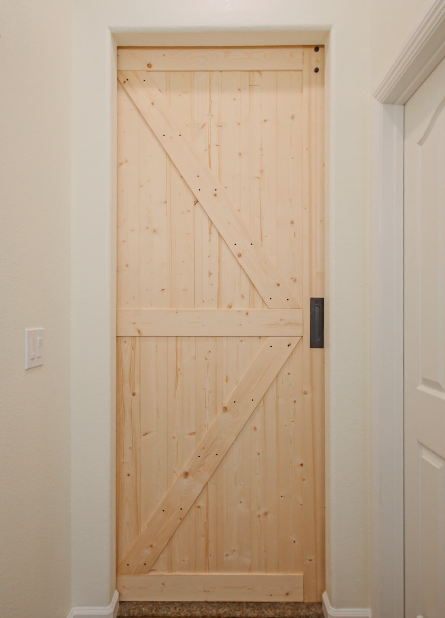 Bathroom Remodel in Sacramento — barn-door entry, crown moulding, hardwood flooring, before remodel — original finishes