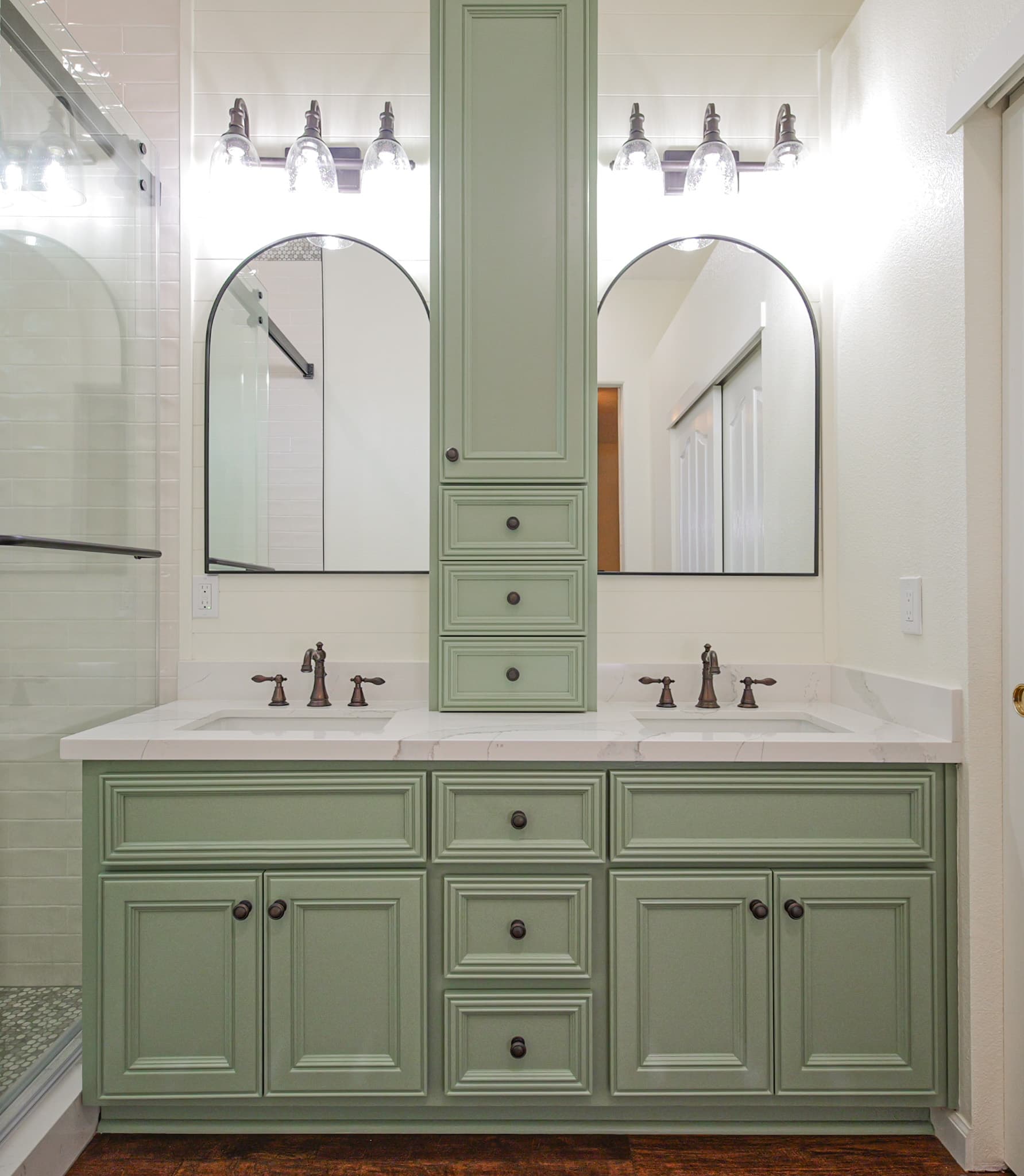 Bathroom Remodel in Sacramento — double vanity, raised-panel cabinets, linen tower, undermount sink, quartz countertop