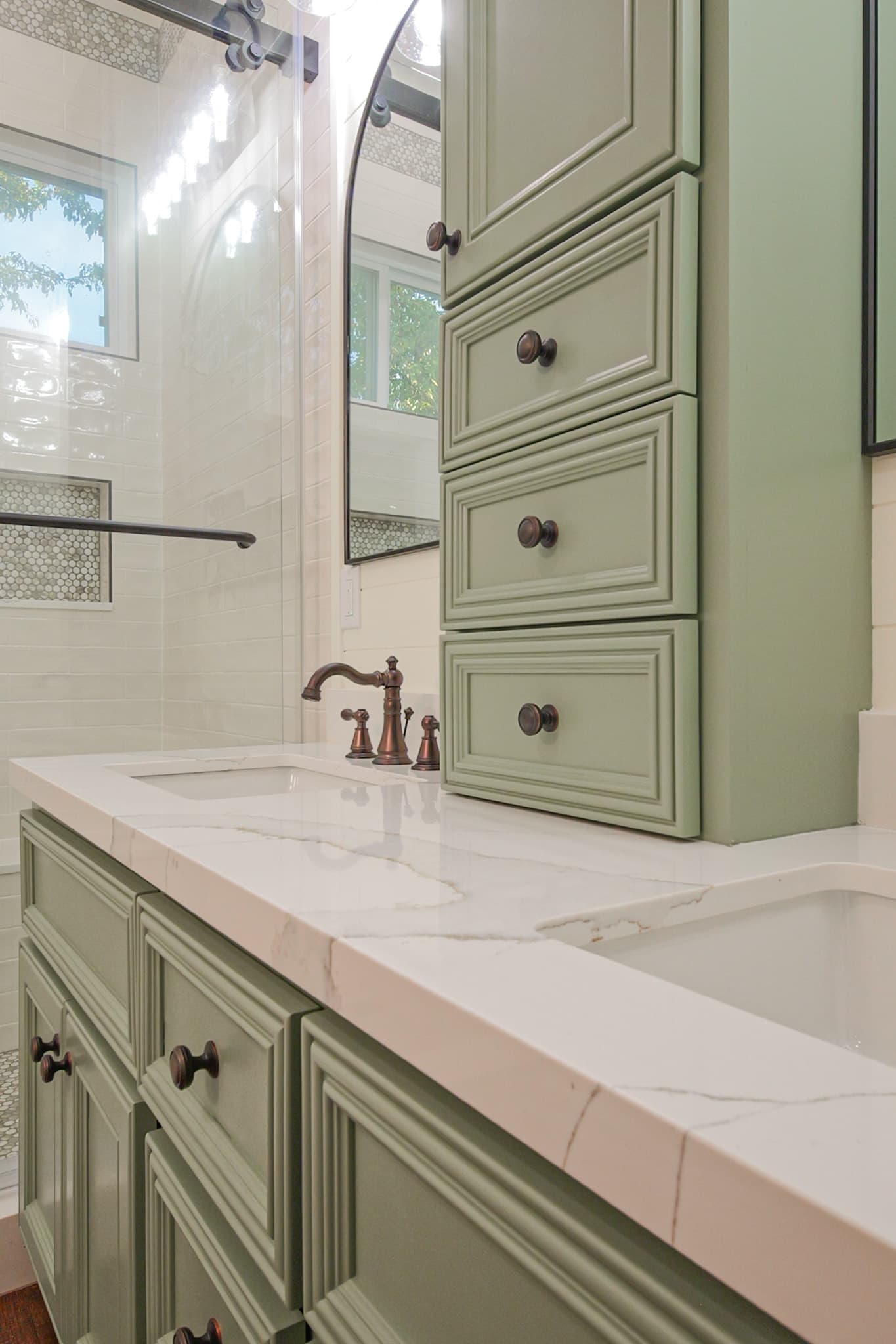Bathroom Remodel in Sacramento — raised-panel cabinets, quartz countertop, undermount sink, linen tower, tiled shower surround