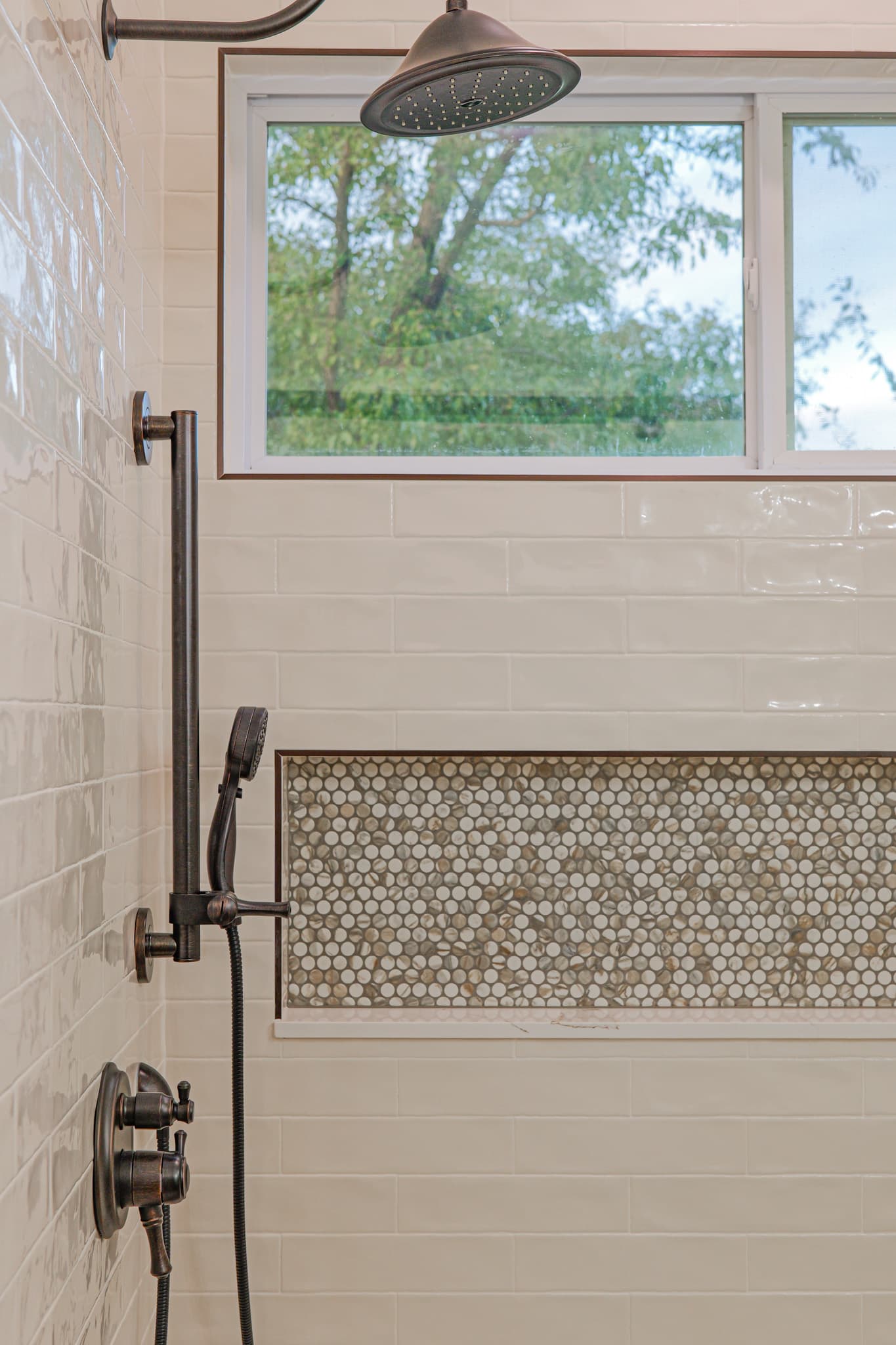 Bathroom Remodel in Sacramento — walk-in shower, tiled shower surround, rain shower head, handheld shower, mosaic backsplash