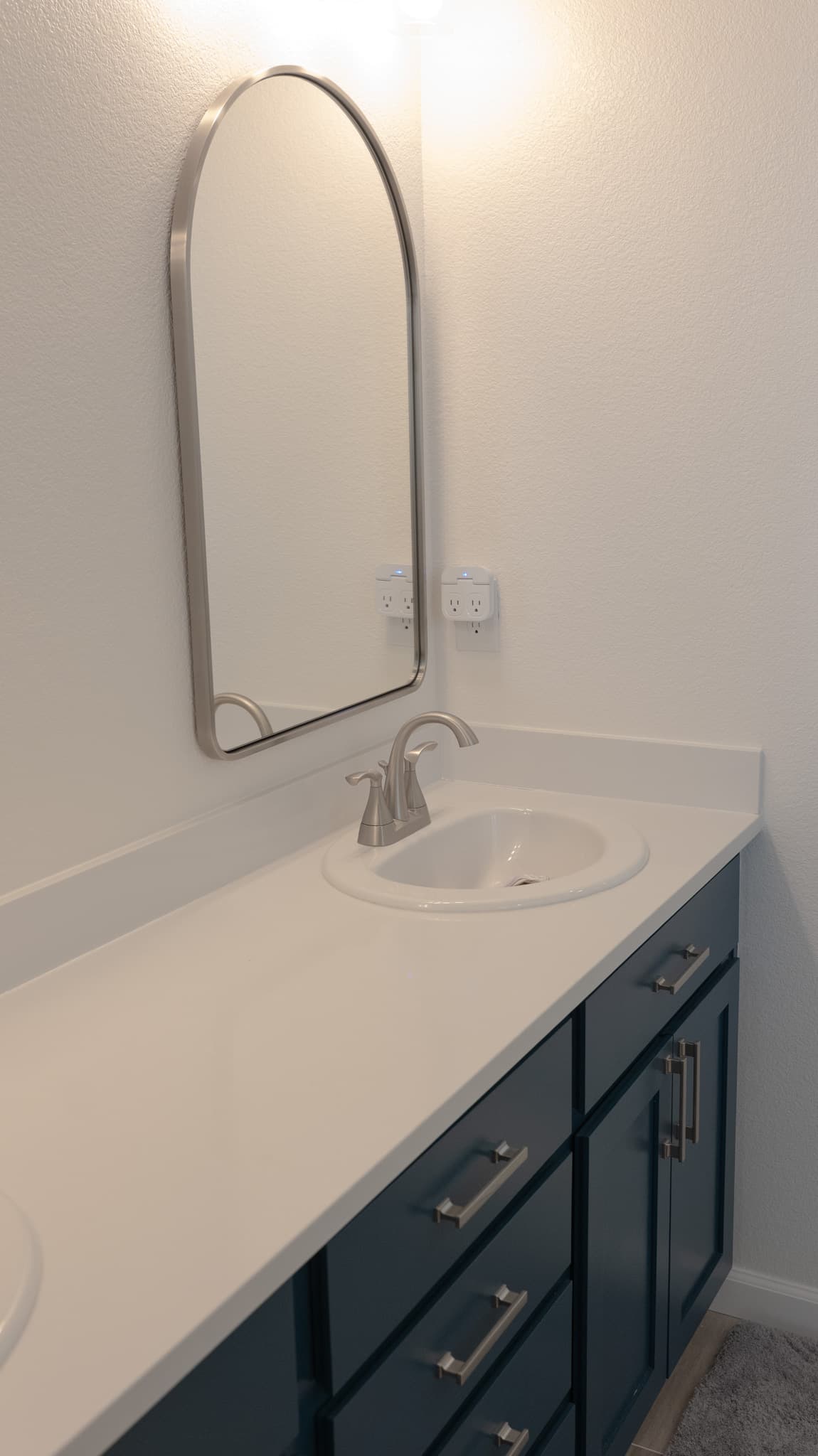 Bathroom Remodel in Sacramento — single vanity, framed mirror, quartz countertop, undermount sink, shaker cabinets