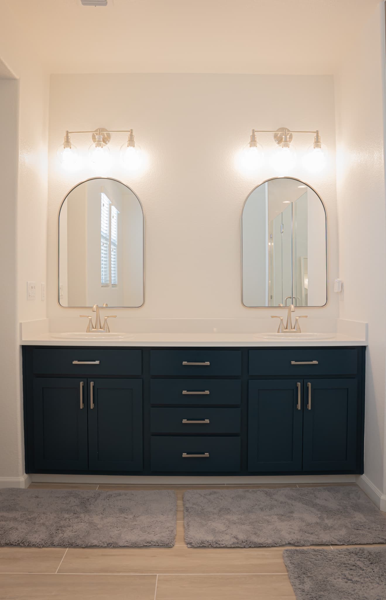 Bathroom Remodel in Sacramento — double vanity, floating vanity, shaker cabinets, quartz countertop, framed mirror