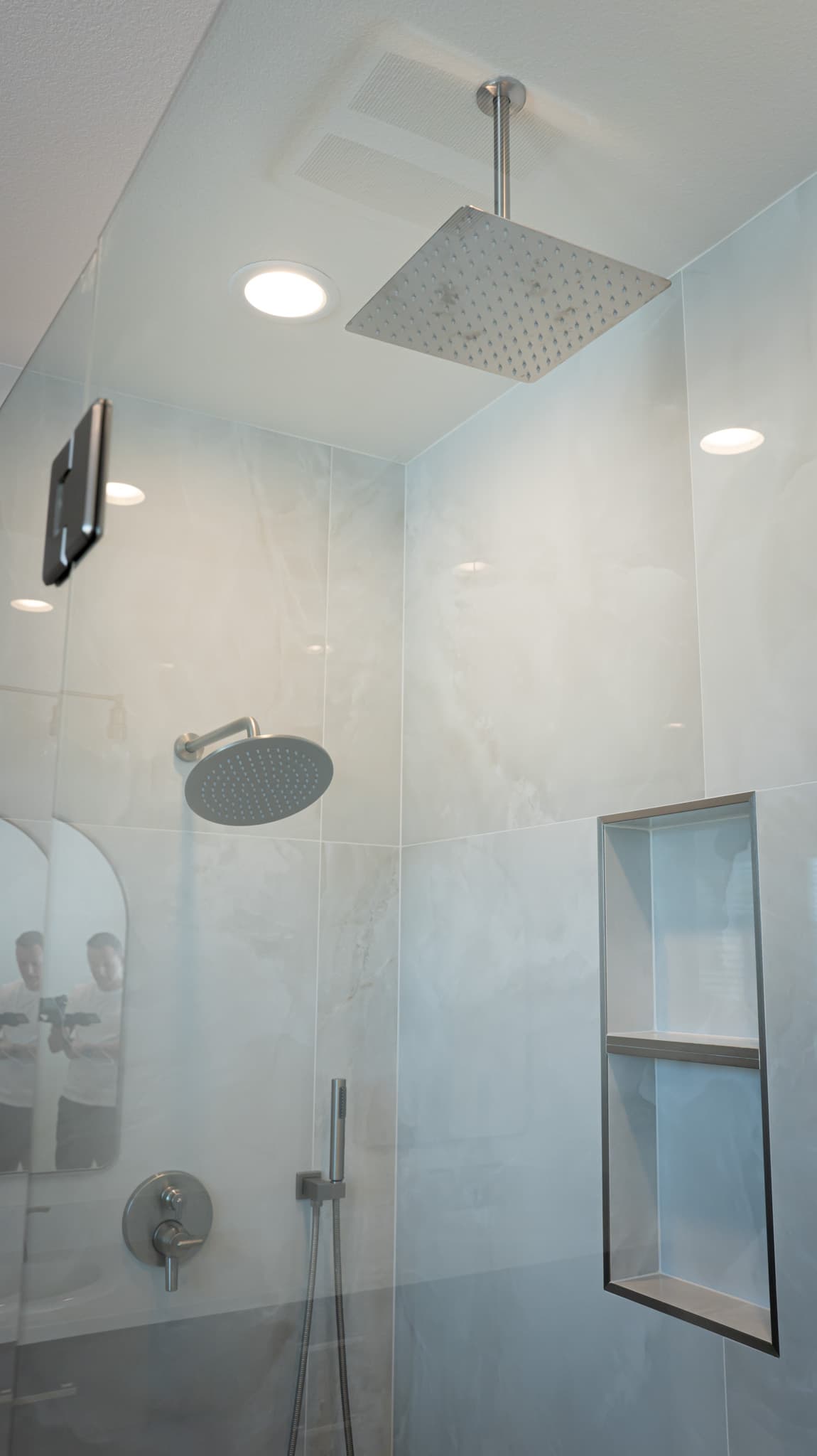 Bathroom Remodel in Sacramento — walk-in shower, rain shower head, handheld shower, tiled shower surround, recessed lighting