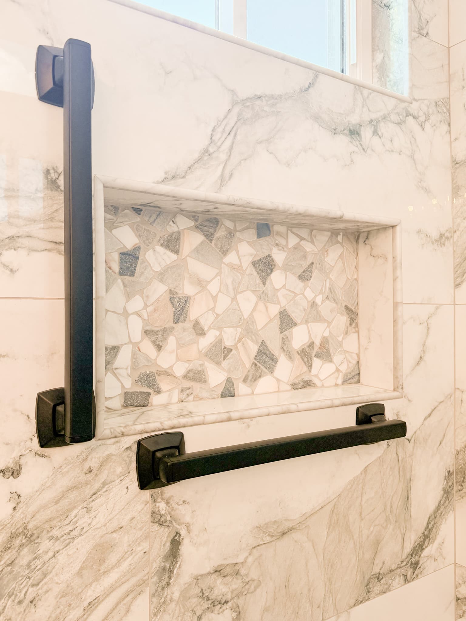 Bathroom Remodel in El Dorado Hills — tiled shower surround, marble tile flooring, mosaic backsplash, walk-in shower, natural-stone backsplash